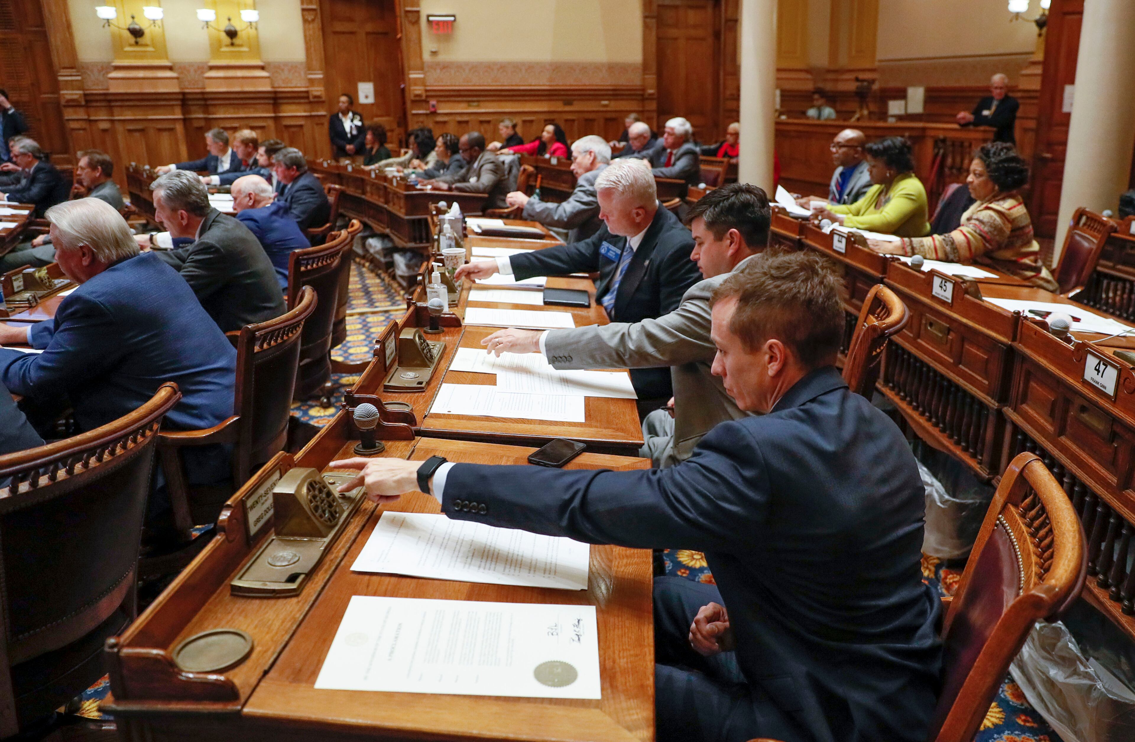 March 16, 2020 - Atlanta - Senators vote on the resolution. Georgia lawmakers gathered in an extraordinary special session on Monday and voted to grant Gov. Brian Kemp sweeping new powers to respond to the coronavirus pandemic. It's the first time in state history a governor has declared a public health emergency, and Kemp cast it as essential to deploy all available resources to contain a disease that's sickened dozens of Georgians and has killed one. Bob Andres / robert.andres@ajc.com