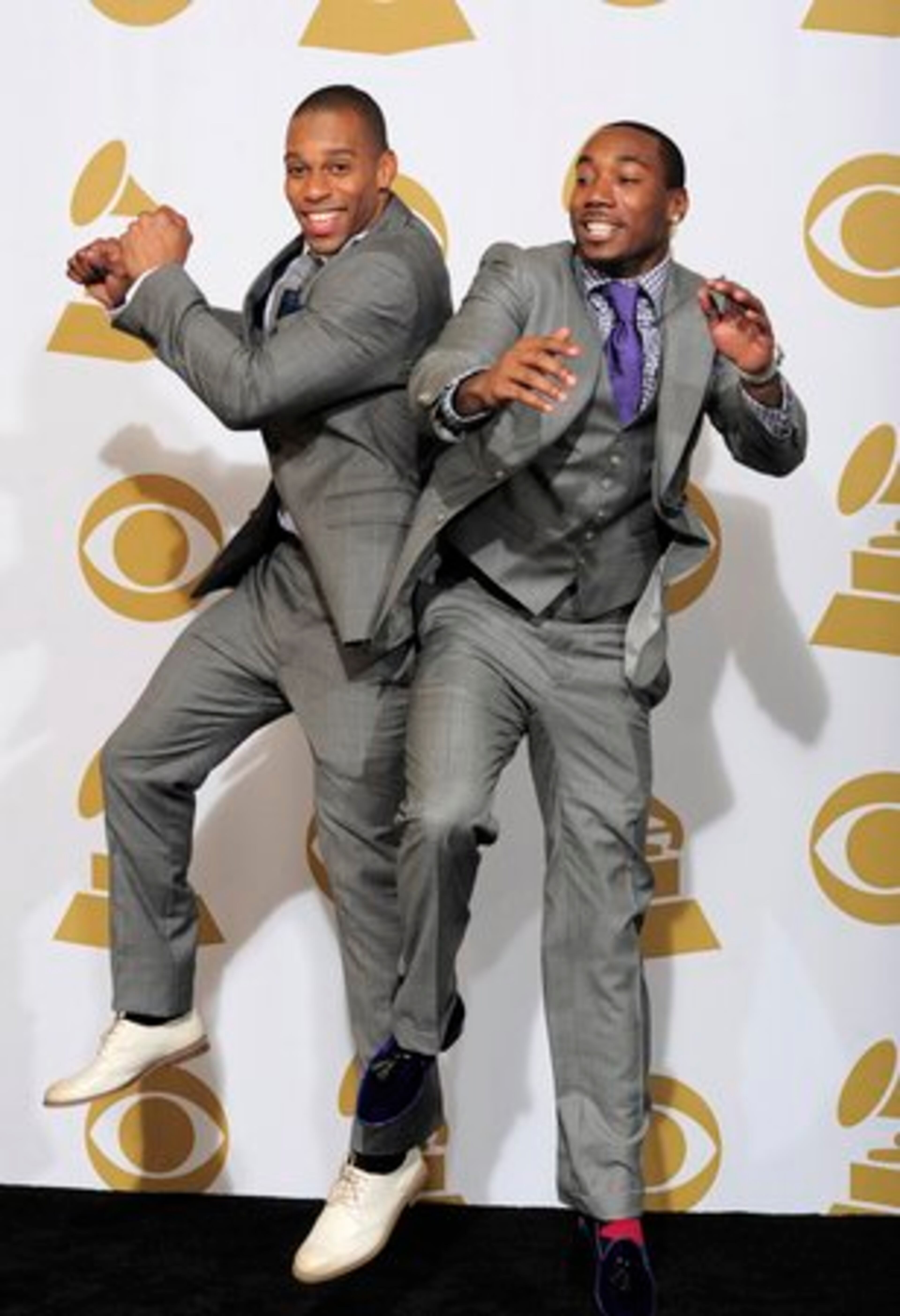 They may have won a Vince Lombardi Trophy, but New York Giants Victor Cruz (left) and Mario Manningham still celebrated like champions at the Grammys.
