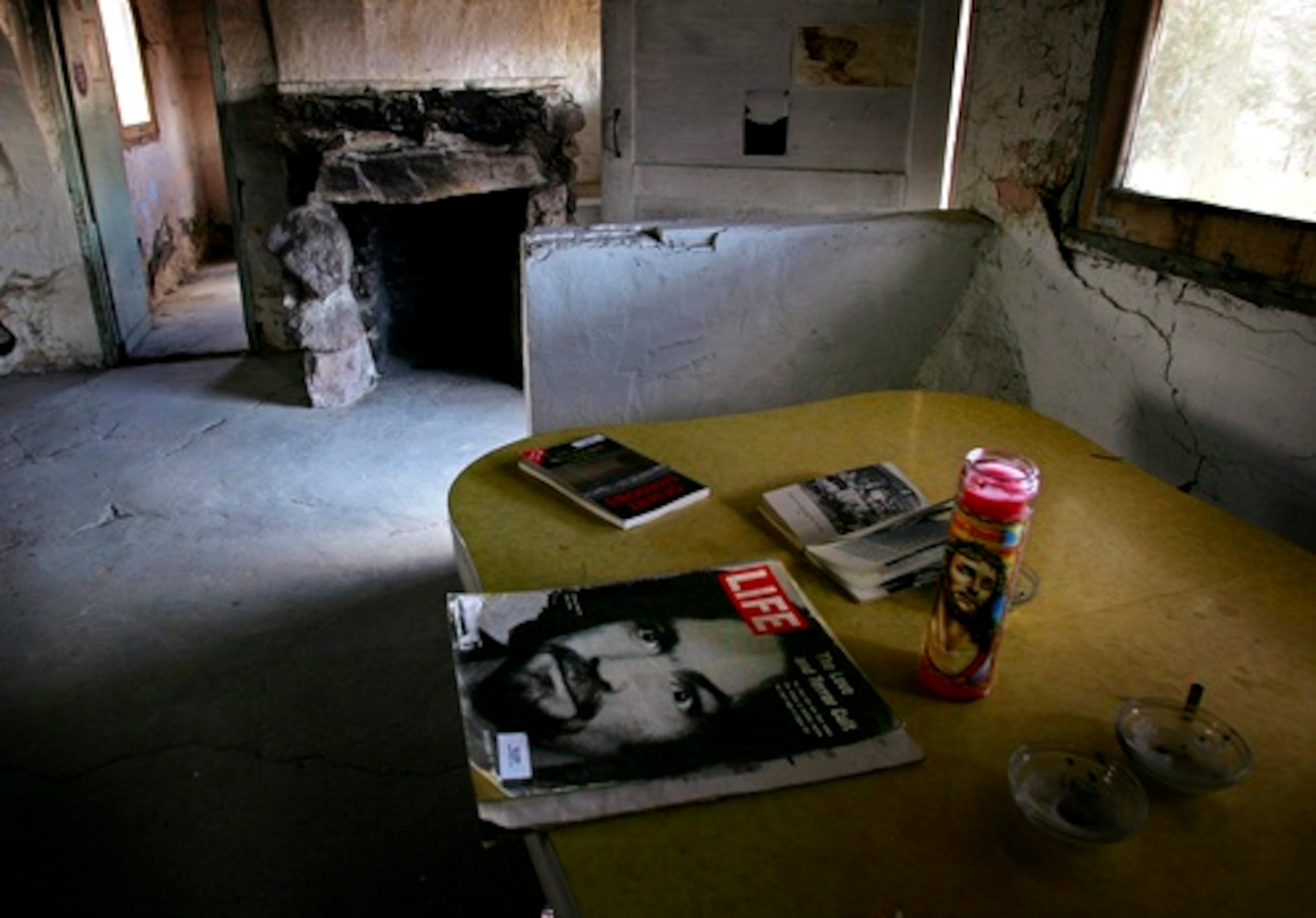 Charles Manson on the cover is left on a the kitchen table in the abandoned Barker Ranch house in the Panamint Mountains west of Death Valley National Park, Calif. Barker Ranch was one of several hideouts used by Manson and his followers.
