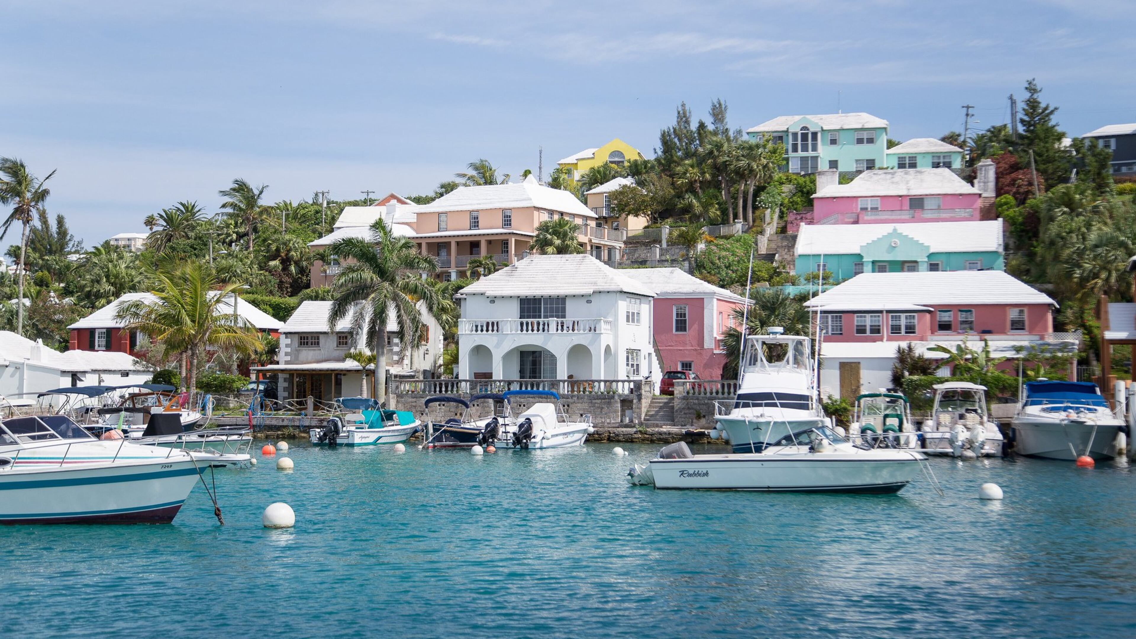 Bermuda’s Flatts Inlet, where luminous turquoise waters lap shell-pink sand beaches; frangipani perfumes the air, and pastel colored houses snuggle behind winding hedgerow-bordered roads. (Bermuda Tourism Authority/TNS)