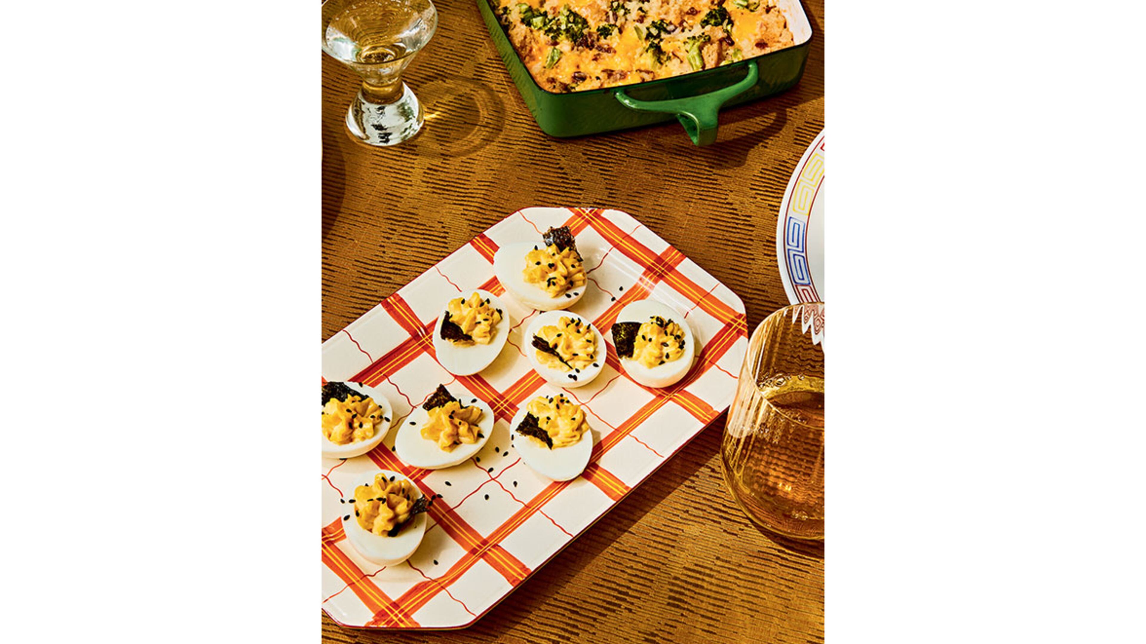 Sesame-Soy Deviled Eggs
“Reprinted from Korean American. Copyright © 2022 Eric Kim. Photographs copyright © 2022 Jenny Huang. Published by Clarkson Potter, an imprint of Random House.”