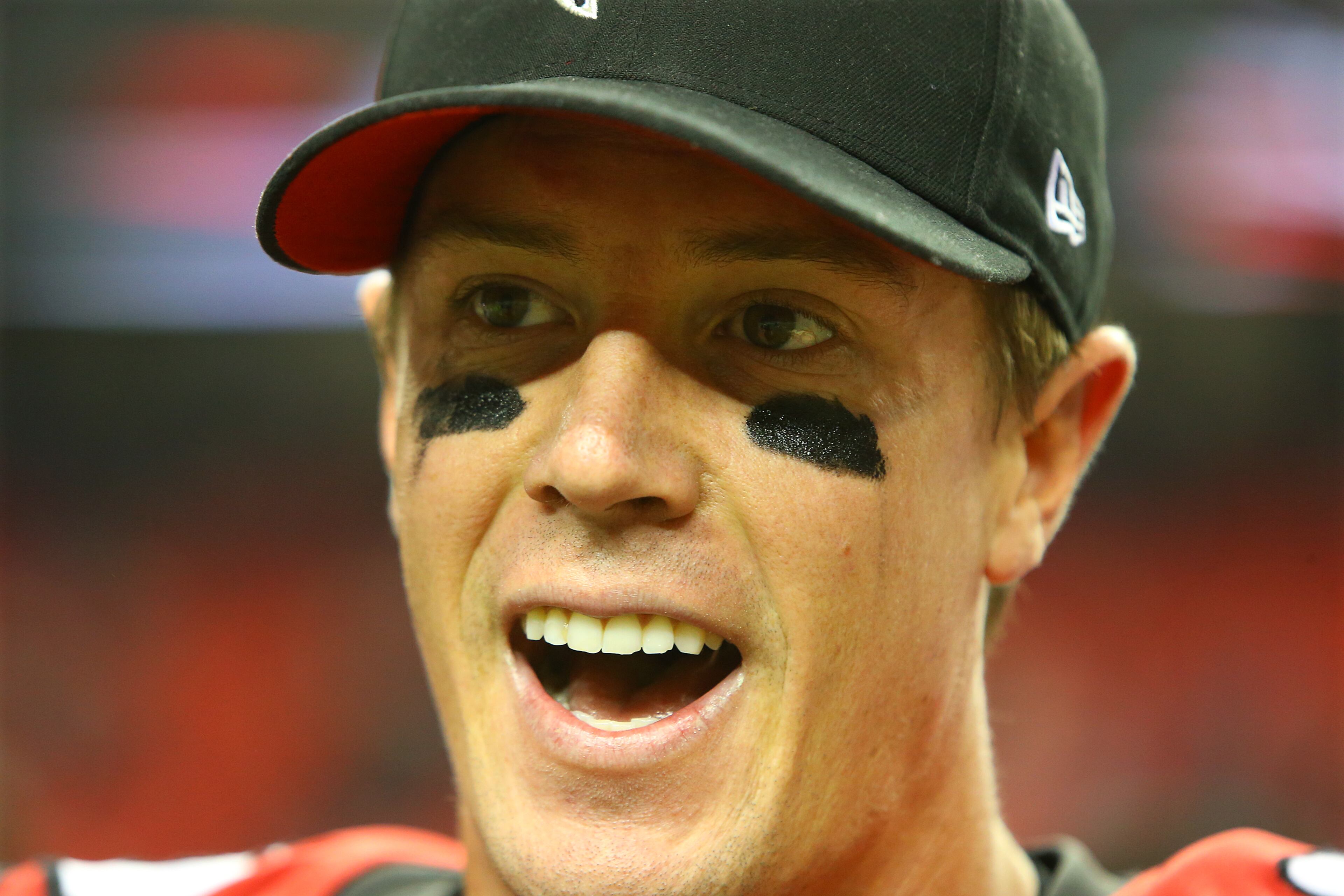 Falcons quarterback Matt Ryan has something to smile about for a change after defeating the Redskins 27-26 in their NFL football game on Sunday, Dec. 15, 2013, in Atlanta.