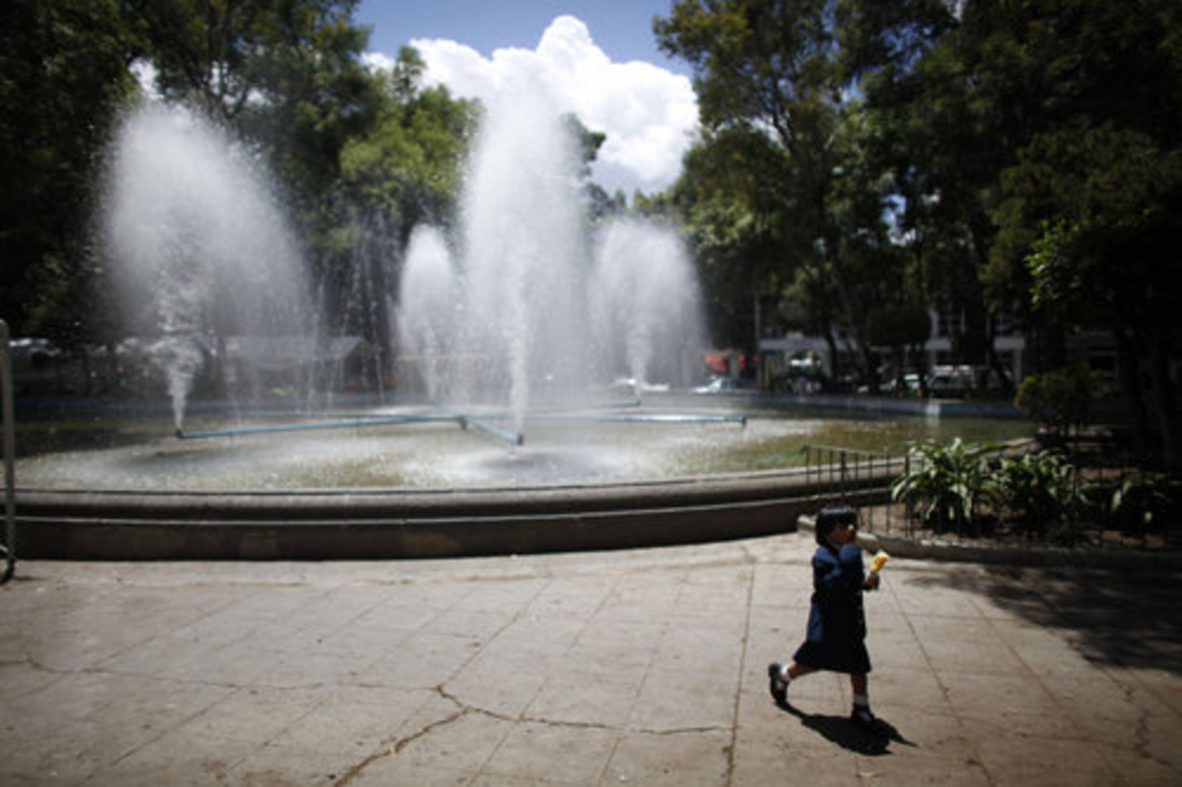 A child walks past a fountain at the Luis Cabrera Plaza in Mexico City. An obligatory stop on any Beat tour is Plaza Luis Cabrera, on Orizaba at Zacatecas Street, an attractive cafe-ringed plaza with trees and a fountain. In the 1950s it was a favorite hangout for Beat writers talking nirvana in a haze of marijuana, heroin and alcohol.