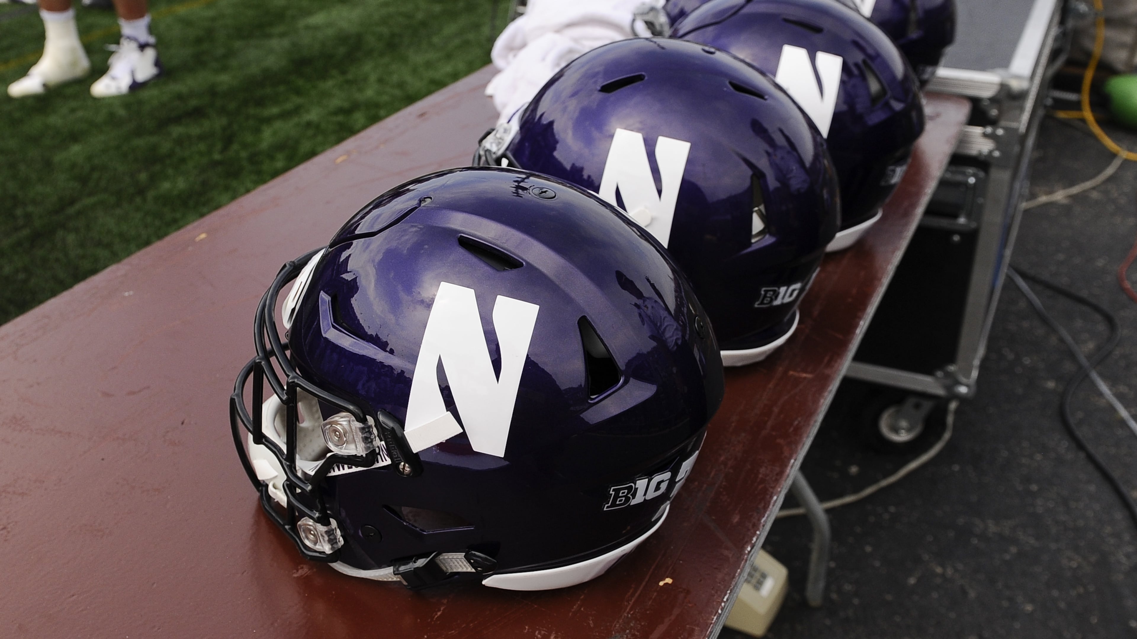 FILE - Northwestern football helmets at an NCAA college football against Stanford in Evanston, Ill, Sept. 5, 2015. (AP Photo/Matt Marton, File)