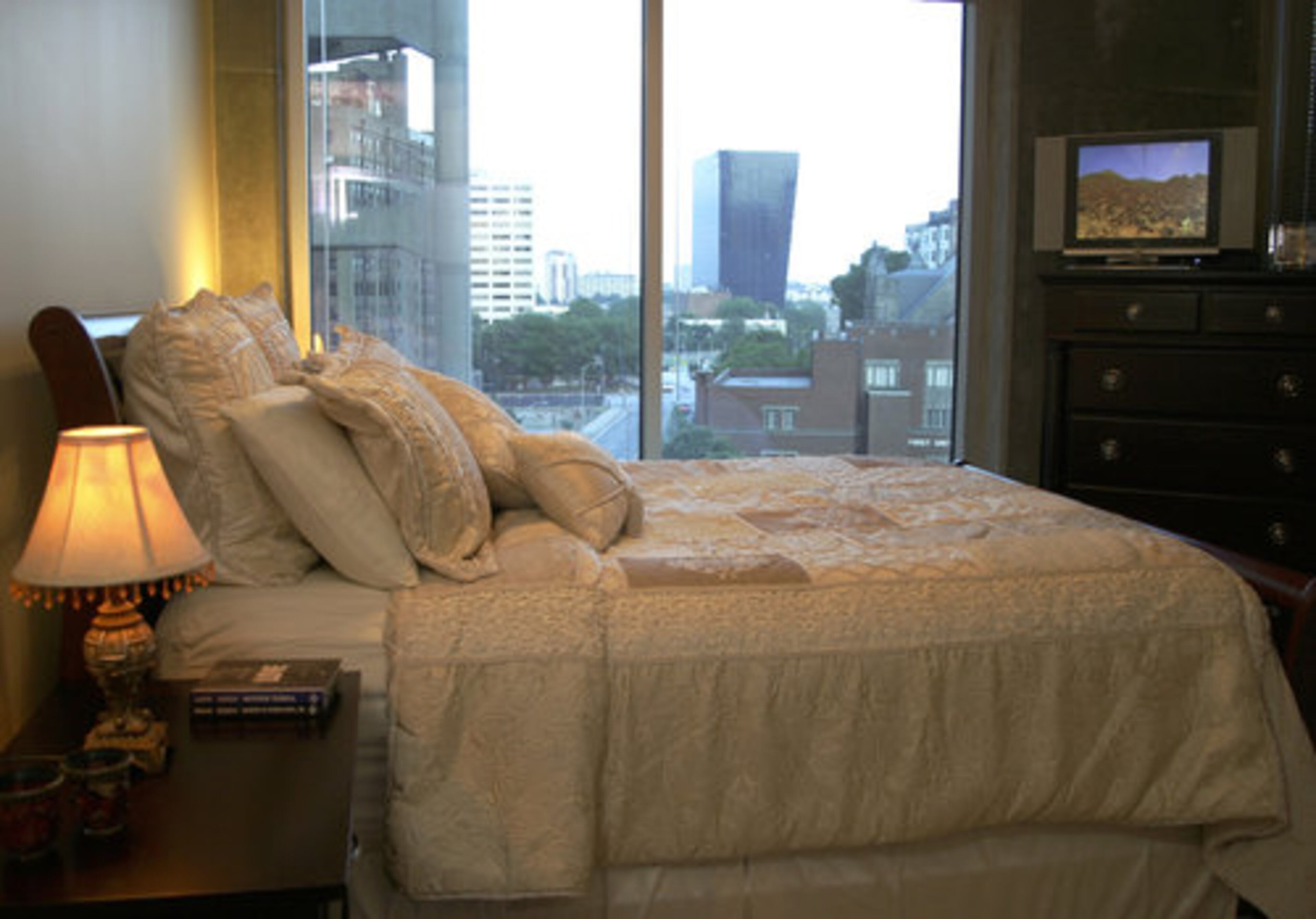 The closet in the master suite was customized to provide true floor-to-ceiling storage, not an inch of wall space was abandoned. "We've maximized the small space that we have," notes Miranda.