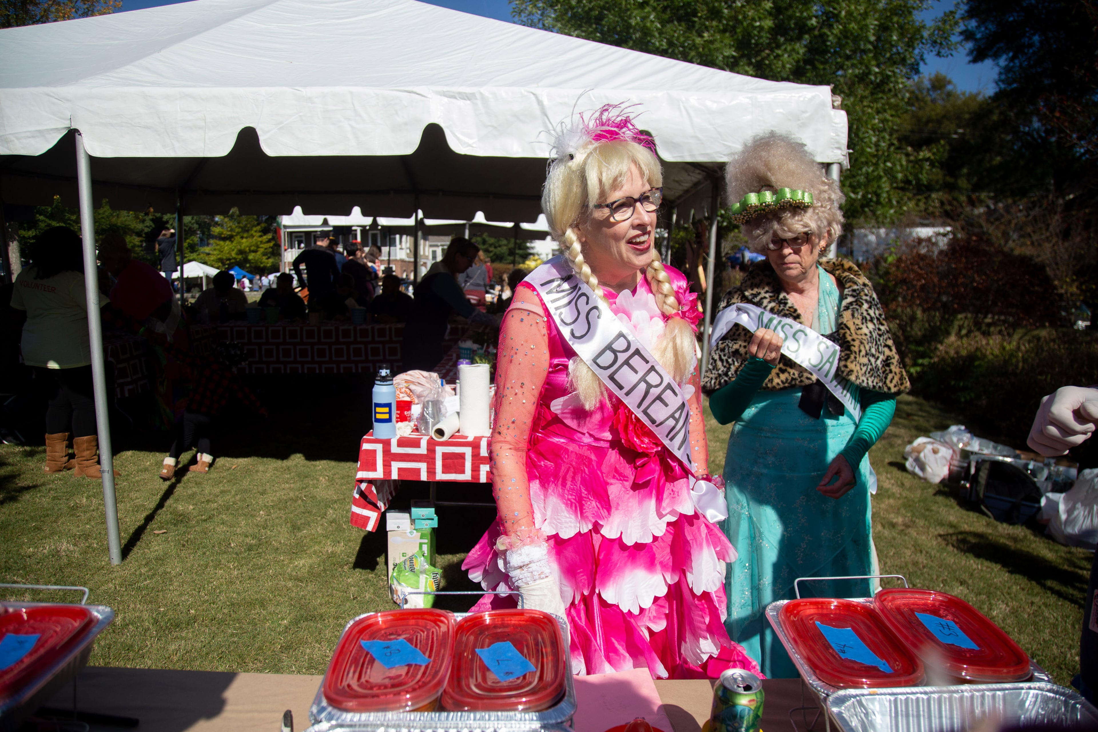 Chili hostesses Ro Denham (L) and Suzanne Mason wait to take chili to the judges during the Chomp & Stomp Chili Cook-off and Bluegrass Festival in Cabbagetown on Saturday, November 2, 2019. STEVE SCHAEFER / SPECIAL TO THE AJC