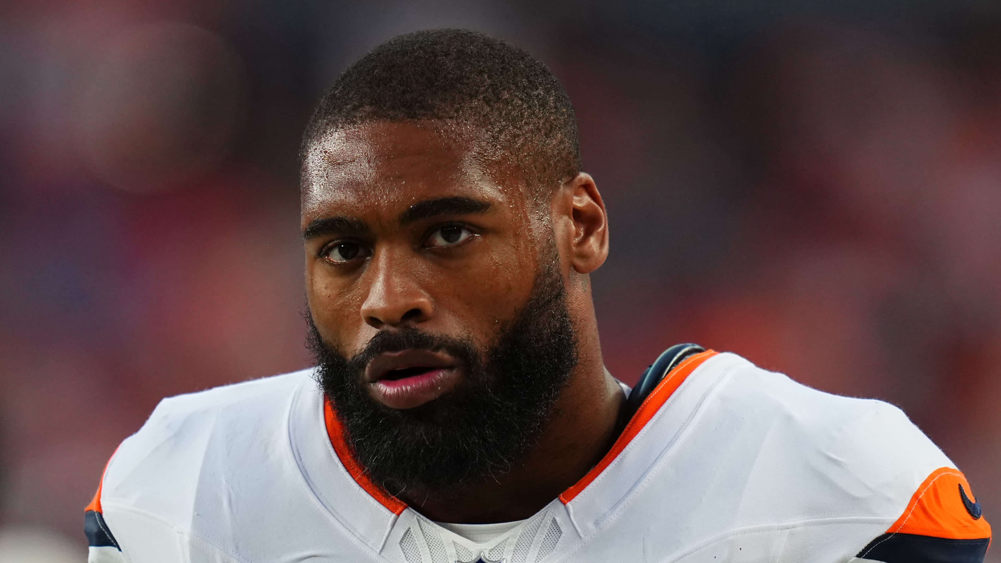 FILE - Denver Broncos linebacker Jonathon Cooper looks on during a preseason NFL football game against the Minnesota Vikings, Aug. 28, 2026, in Denver. (AP Photo/Jack Dempsey, File)