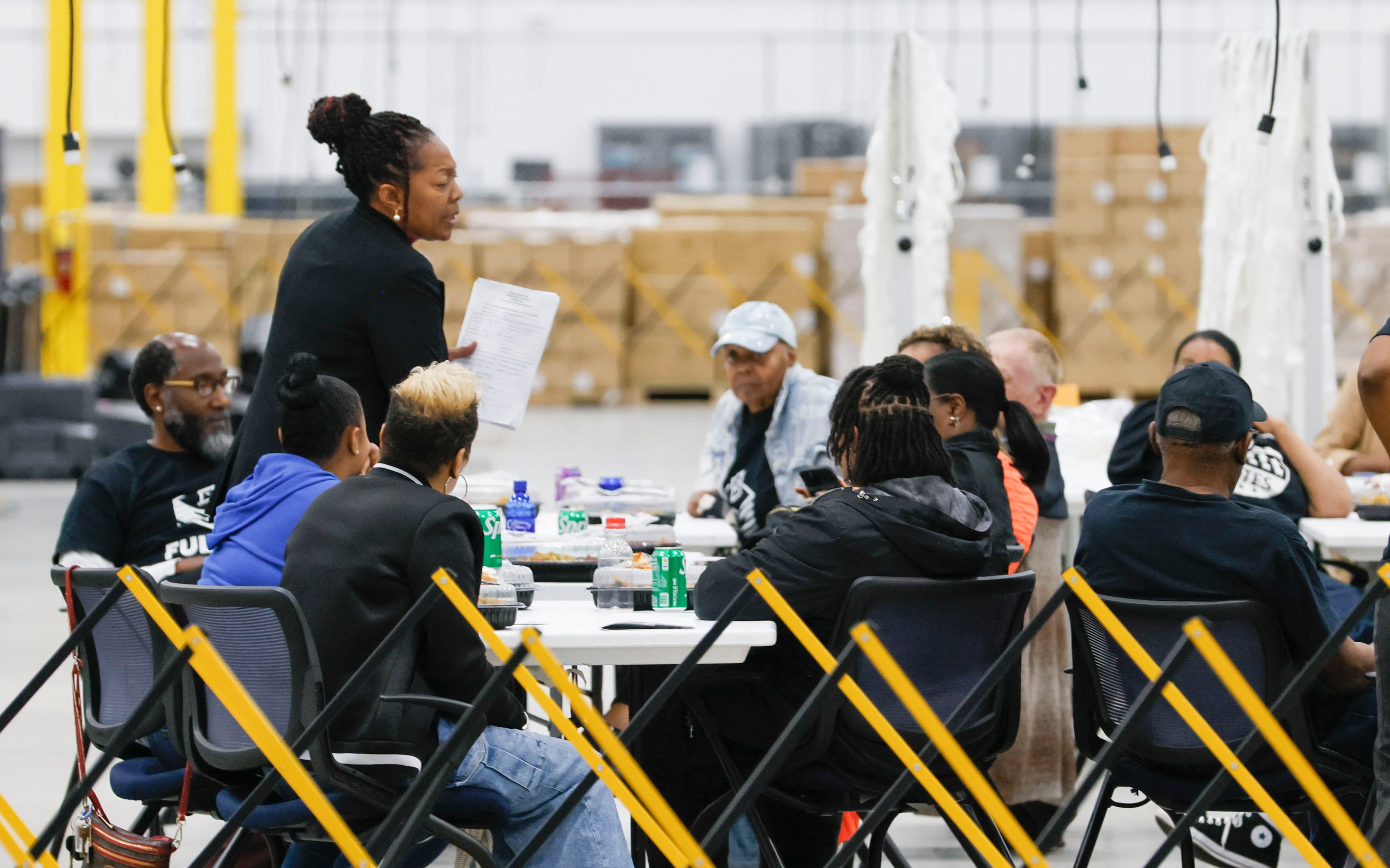 Election workers receive instructions as they wait to process ballots at the Fulton County Election Center, in Atlanta on Tuesday, May 19, 2026, during the 2026 Georgia primary elections.(Bob Andres for the AJC)