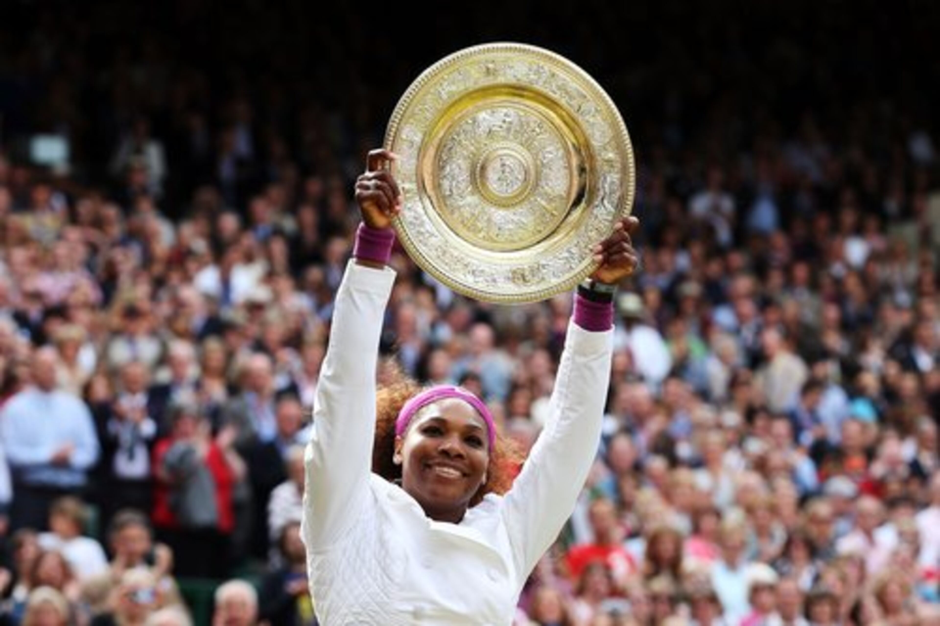 Serena Williams captured her fifth Wimbledon title Saturday with a 6-1, 5-7, 6-2 win over Agnieszka Radwanska.