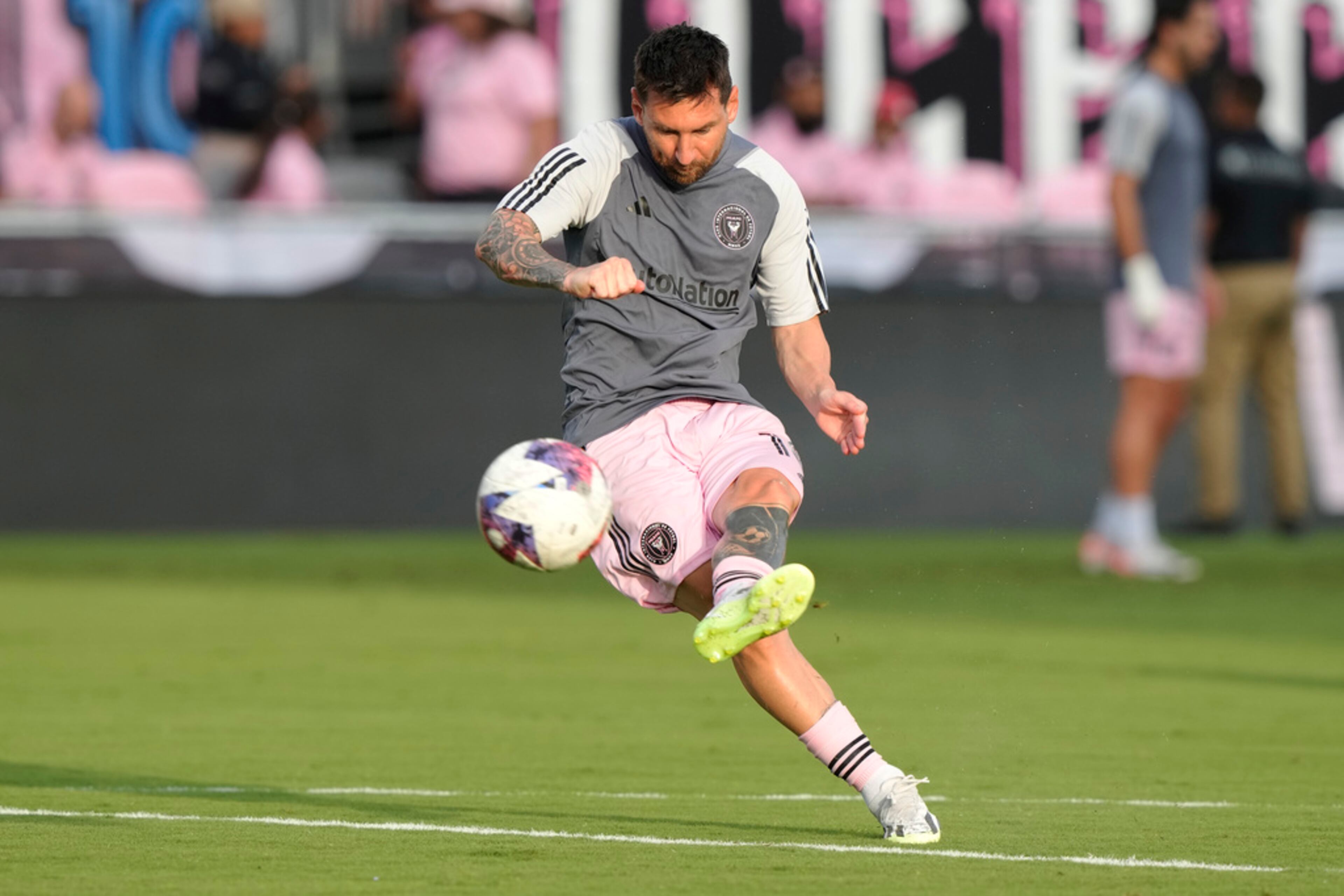 Inter Miami forward Lionel Messi warms up for the team's Leagues Cup soccer match against Atlanta United, Tuesday, July 25, 2023, in Fort Lauderdale, Fla. (AP Photo/Lynne Sladky)