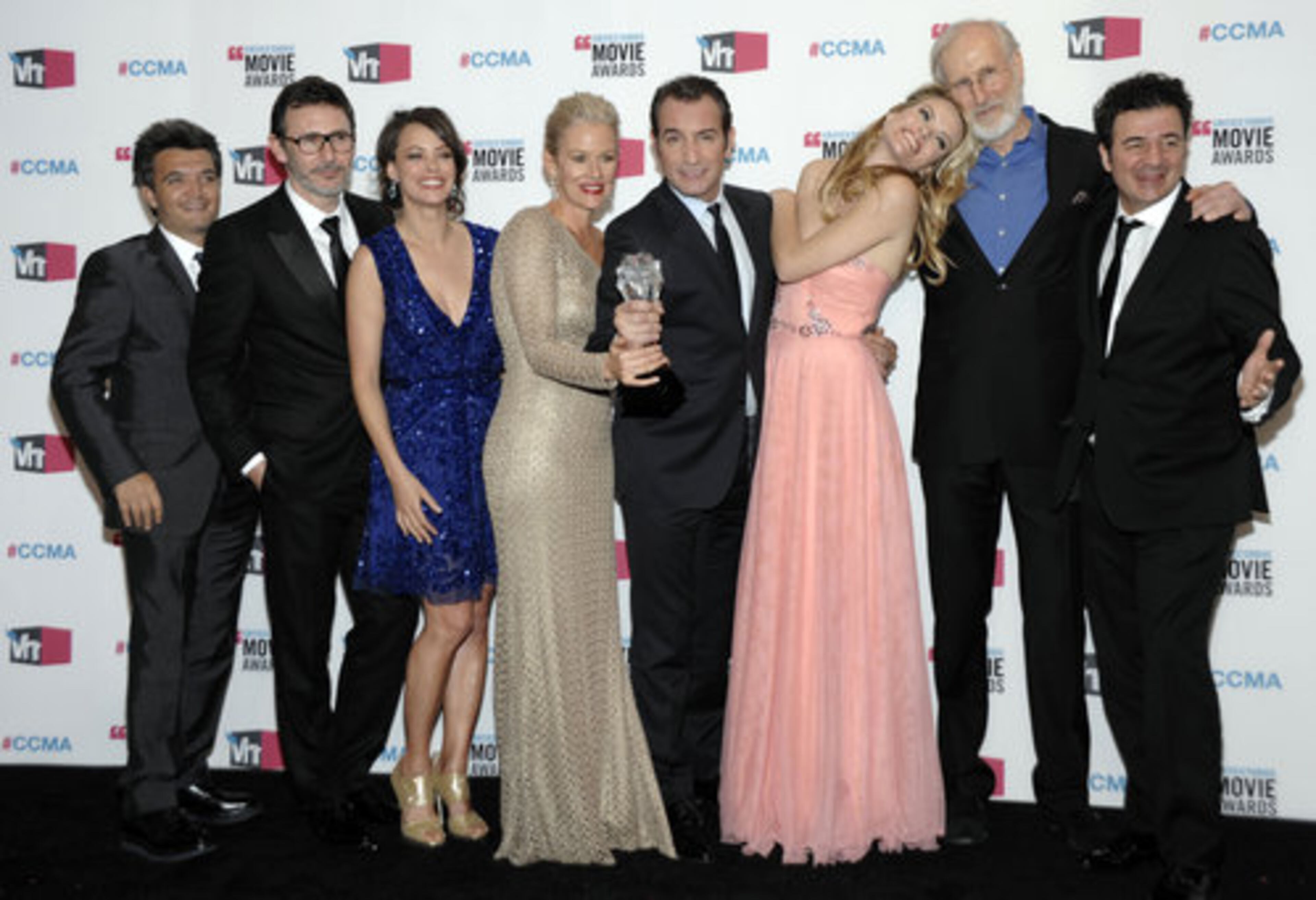 rom left, producer Thomas Langmann, director Michel Hazanavicius, actors Berenice Bejo, Penelope Ann Miller, Jean Dujardin, Missi Pyle, James Cromwell, and composer Ludovic Bource pose backstage with the award for best picture for "The Artist" at the 17th Annual Critics' Choice Movie Awards on Thursday, Jan. 12, 2012 in Los Angeles.