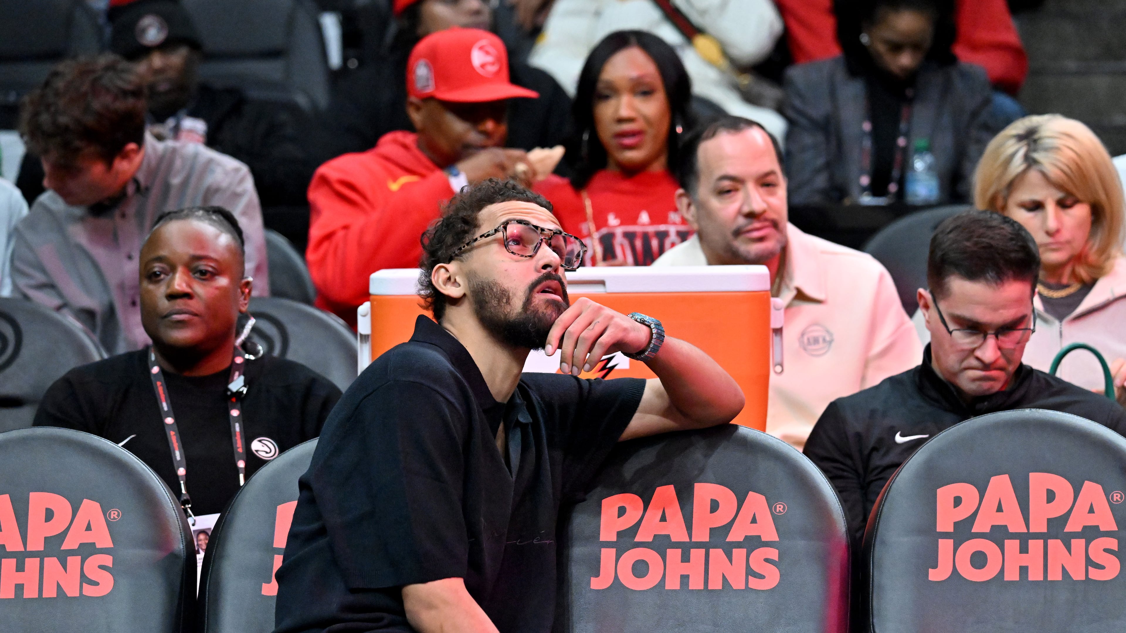 Trae Young sits on the bench as his team faces the New Orleans Pelicans on Wednesday, Jan. 7, 2026. During the fourth quarter, the Atlanta Hawks agreed to trade the four-time All-Star to the Washington Wizards. (Hyosub Shin/AJC)