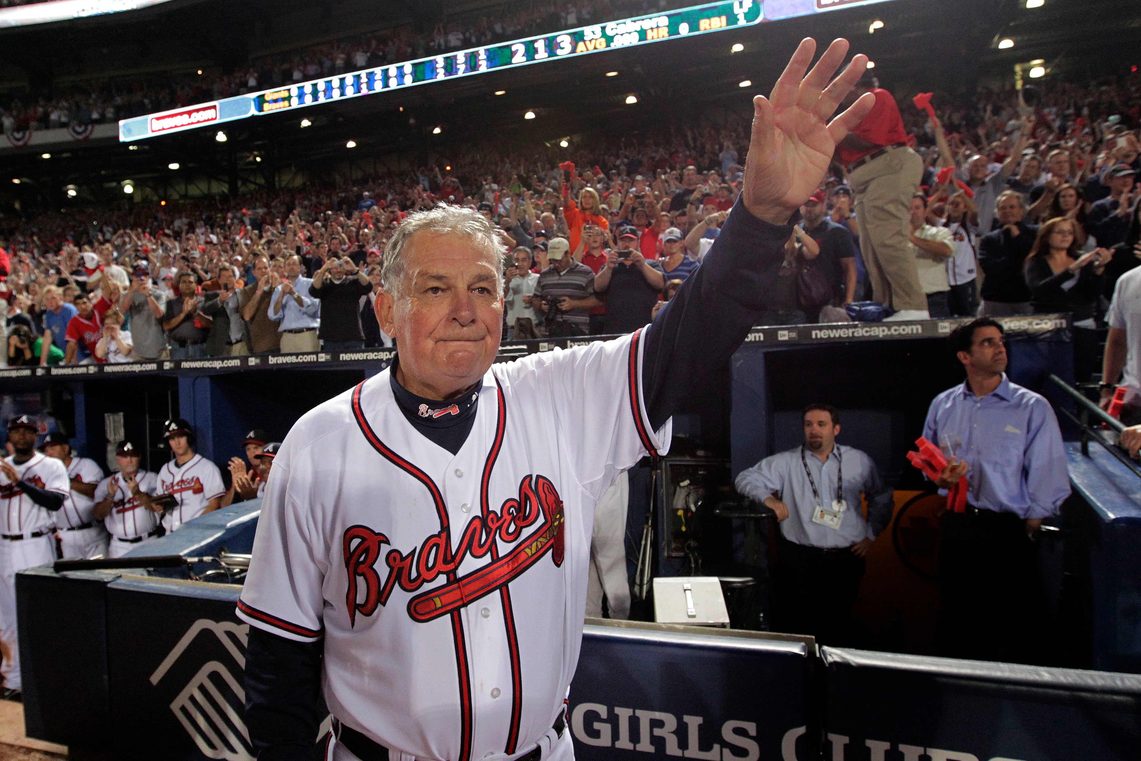 Bobby Cox waves to an adoring crowd at Turner Field after the final game of his managerial career, when the Braves were beaten in the 2010 division series. (AJC fiel photo)