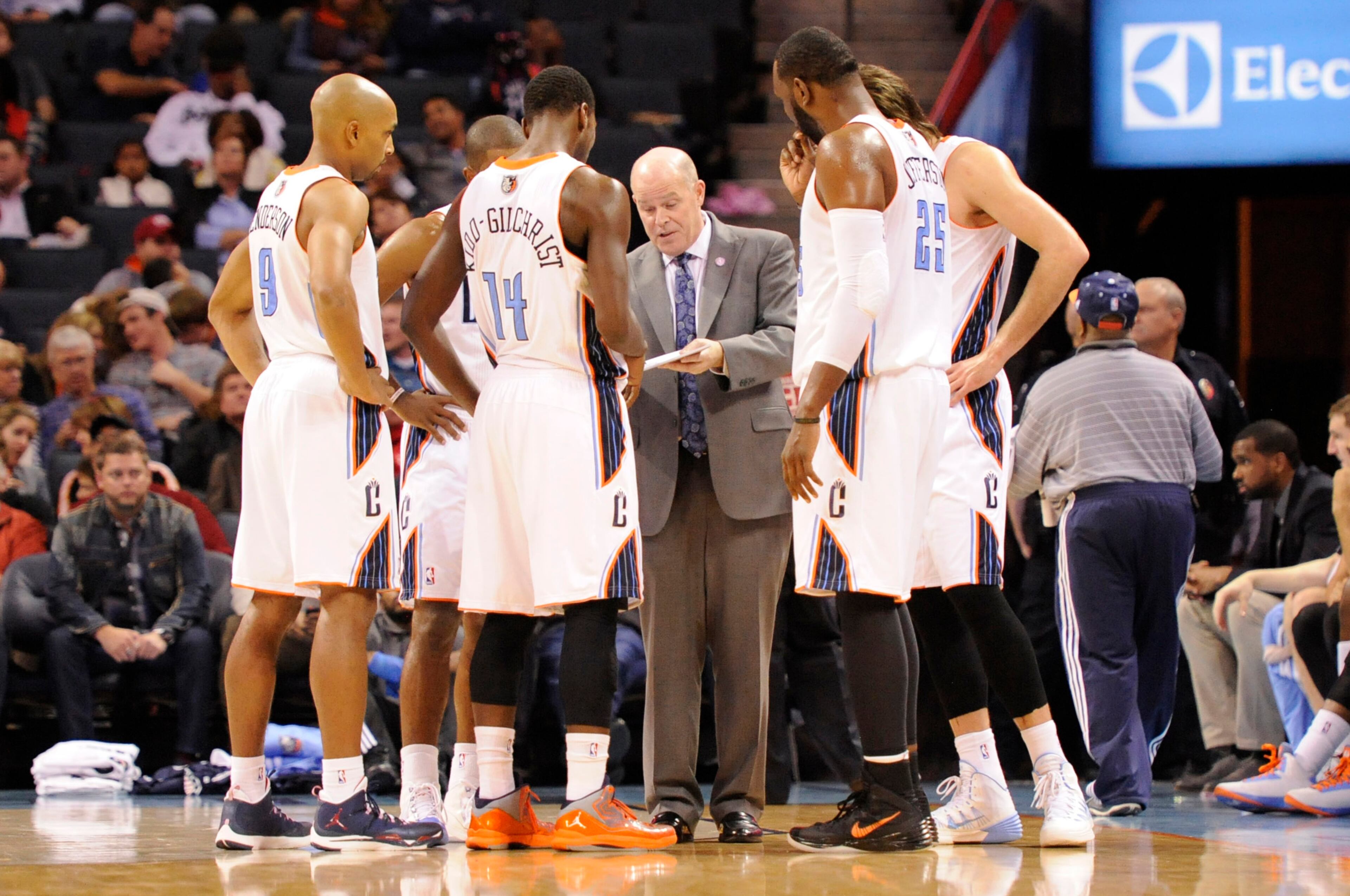 Charlotte Bobcats head coach Steve Clifford talks to the team during the fourth quarter against the Atlanta Hawks at Time Warner Cable Arena. Monday was Clifford's first game back after he underwent a heart procedure. The Hawks won 103-94. Mandatory Credit: Sam Sharpe-USA TODAY Sports