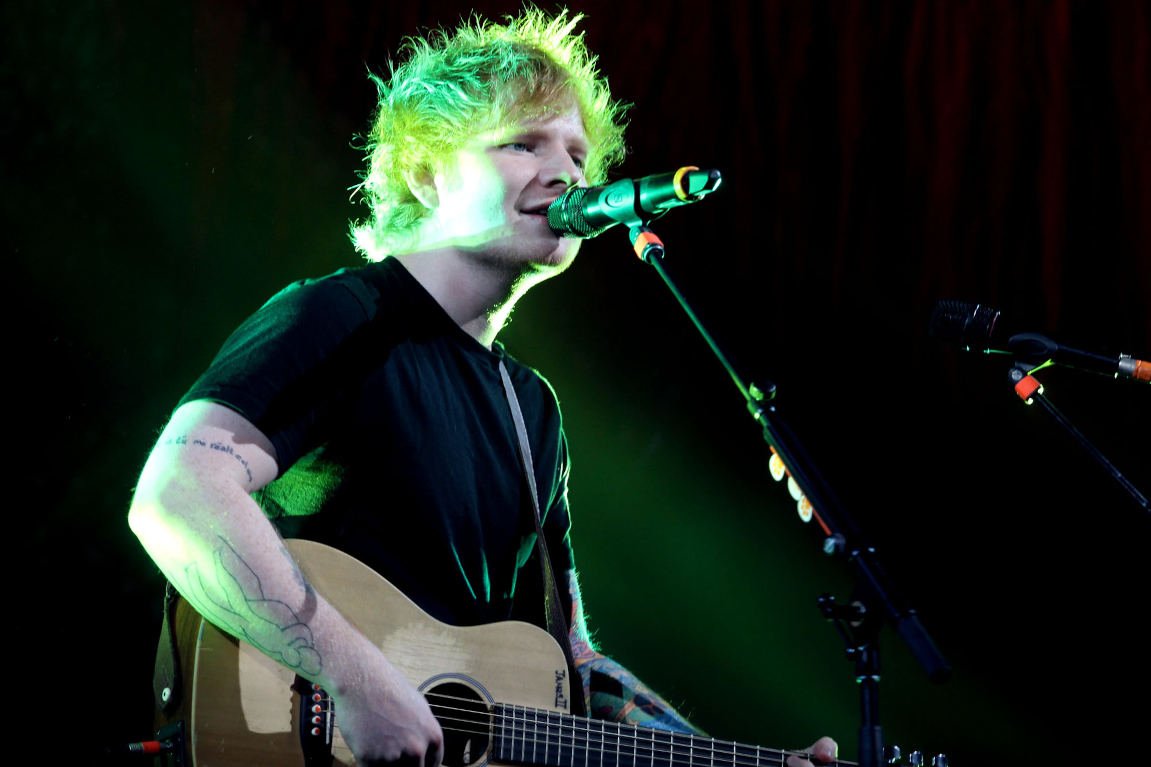 English singer-songwriter Ed Sheeran, opening for Taylor Swift on her RED tour, began his set with hits "Give Me Love" and "Drunk" from his debut album "+" that was certified quintuple platinum in the UK.