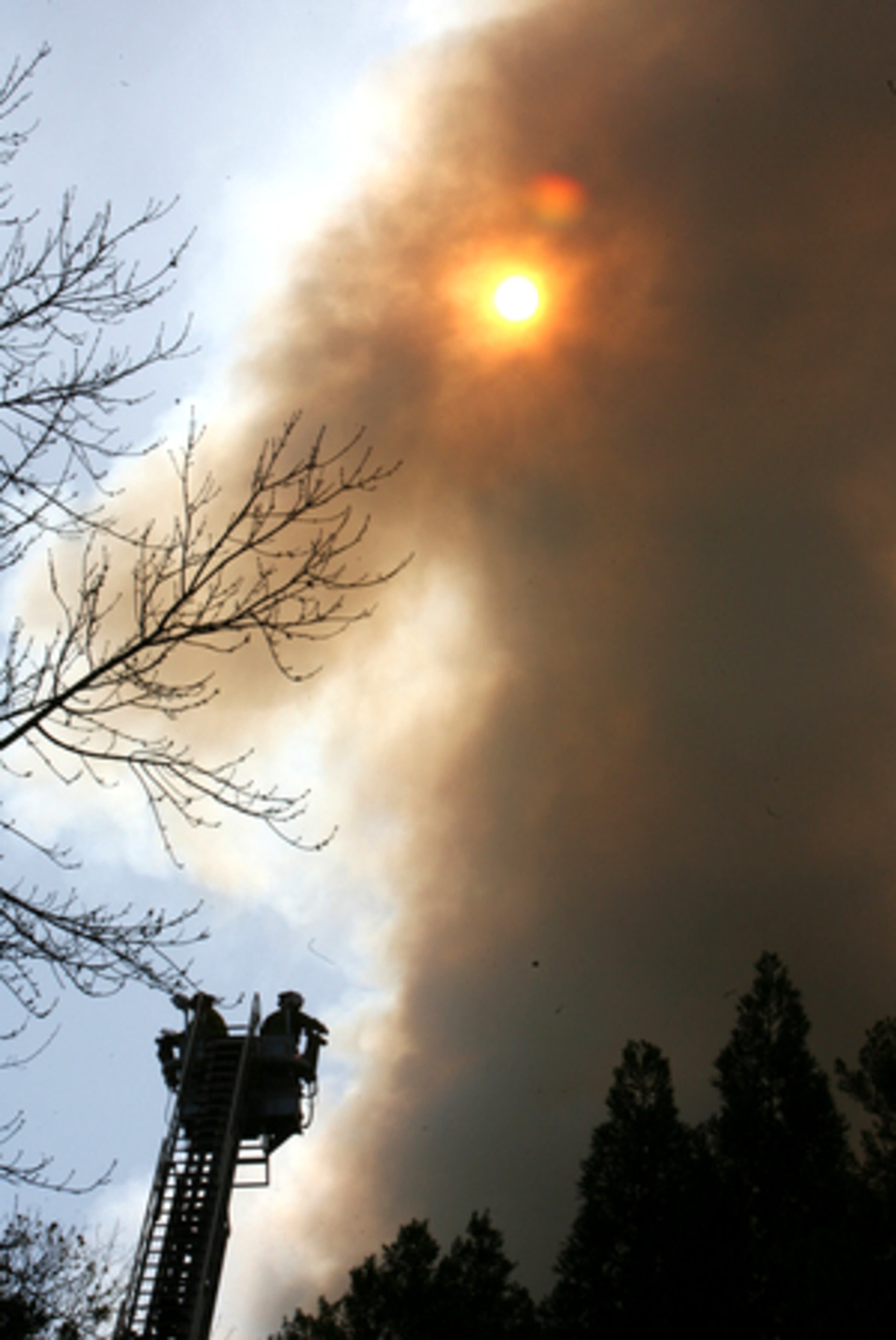 Two adults were taken to the hospital for smoke inhalation and two people were hurt when they jumped from a second-floor balcony at the 188-unit complex off Peachtree Industrial Boulevard.
