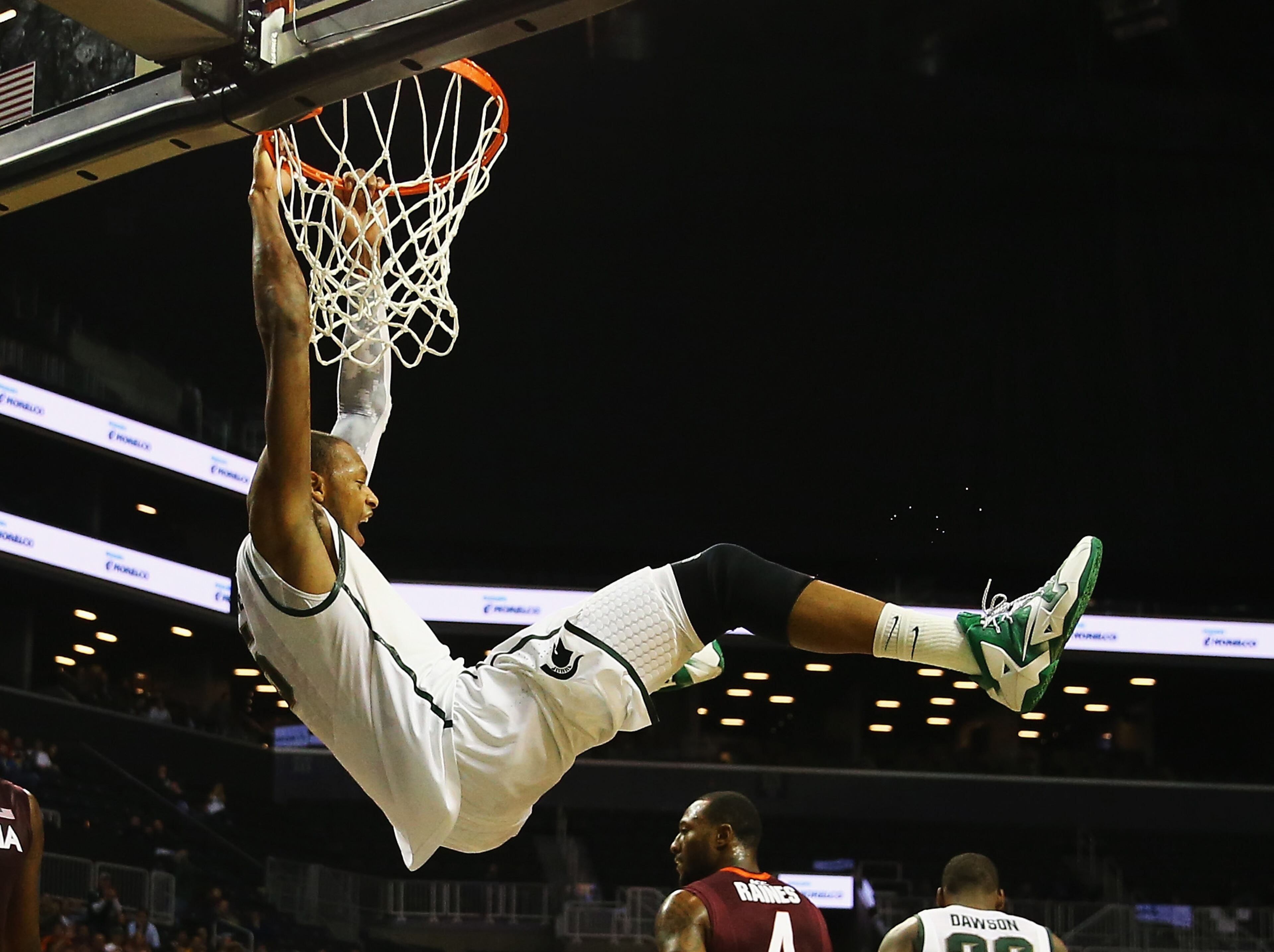 Adreian Payne #5 of the Michigan State Spartans dunks against the Virginia Tech Hokies during their game at the Barclays Center on November 22, 2013 in New York City. (Photo by Al Bello/Getty Images)