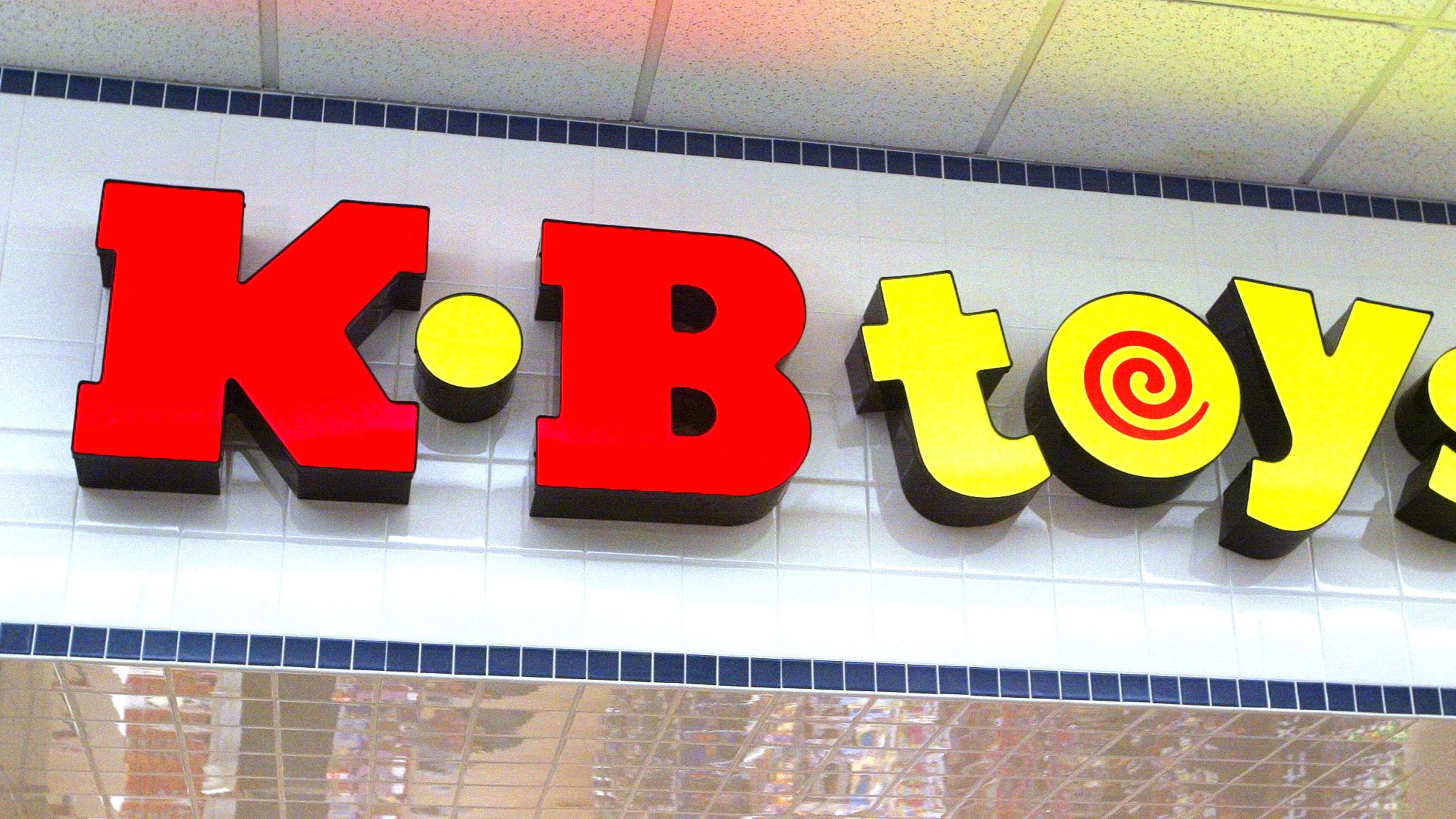 FILE PHOTO: KB Toys signage is visible atop the entranced to its store January 30, 2004 in Norridge, Illinois.