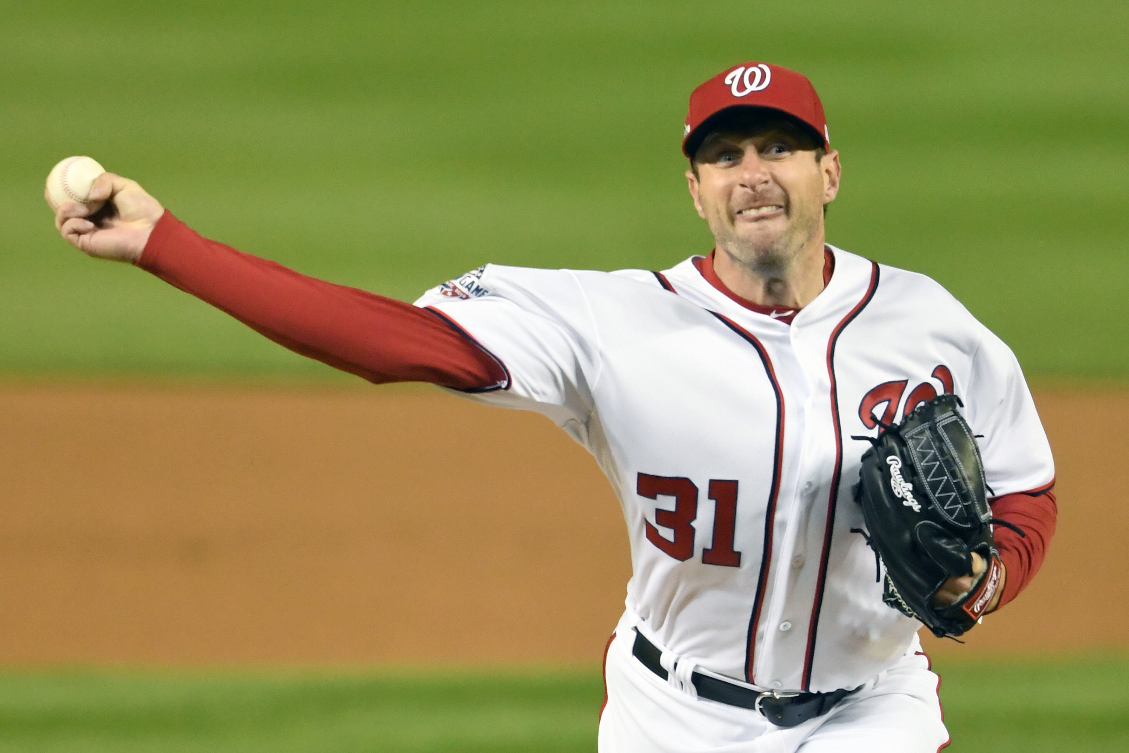 While Julio Teheran was solid in his six innings, Max Scherzer was even better. The righthander pitched a complete-game shutout, allowing only two hits while striking out 10 in the Nationals' 2-0 victory. (Photo by Mitchell Layton/Getty Images)