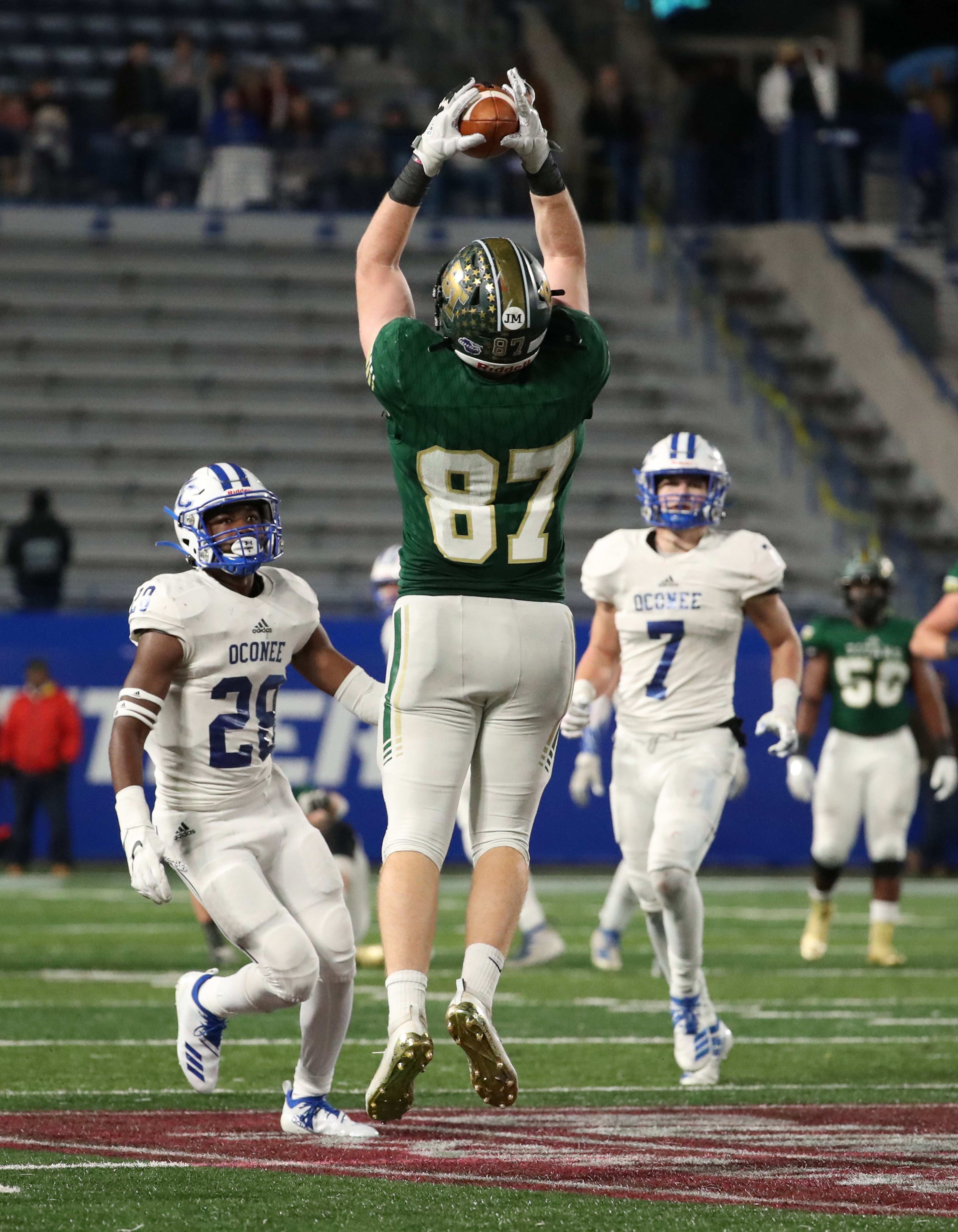Blessed Trinity tight end Grayson Gilder (87) makes a first down catch in the fourth quarter of their 17-14 win against Oconee County in the Class AAAA high school football state title at Georgia State Stadium Saturday, December 14, 2019 in Atlanta. (JASON GETZ/SPECIAL TO THE AJC)