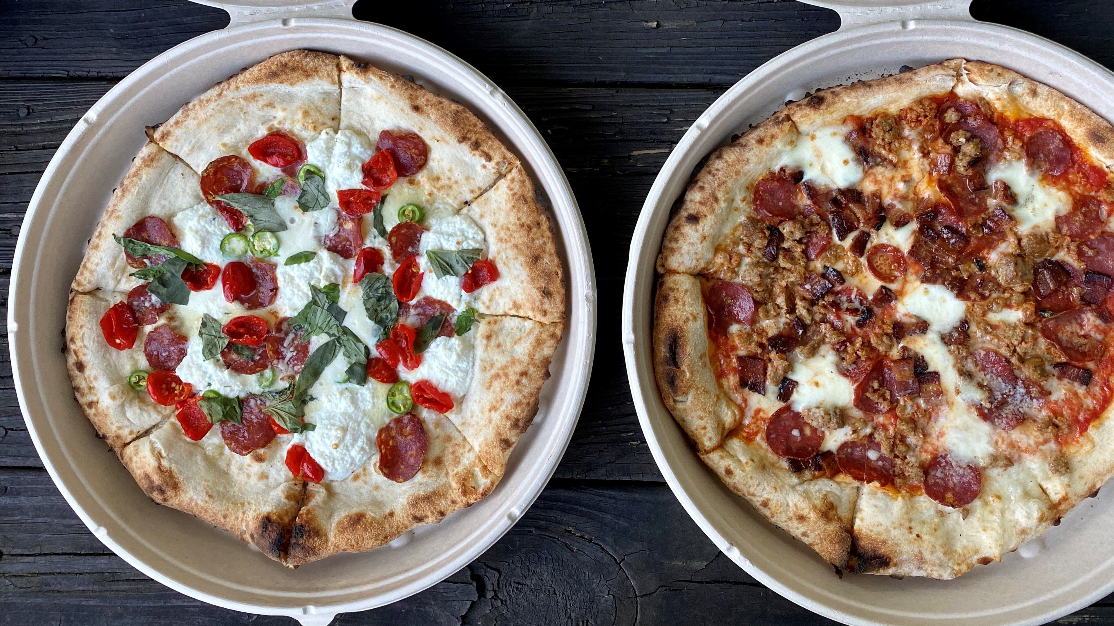 Ammazza offers these fuoco bianco and carne pies for takeout. Wendell Brock for The Atlanta Journal-Constitution