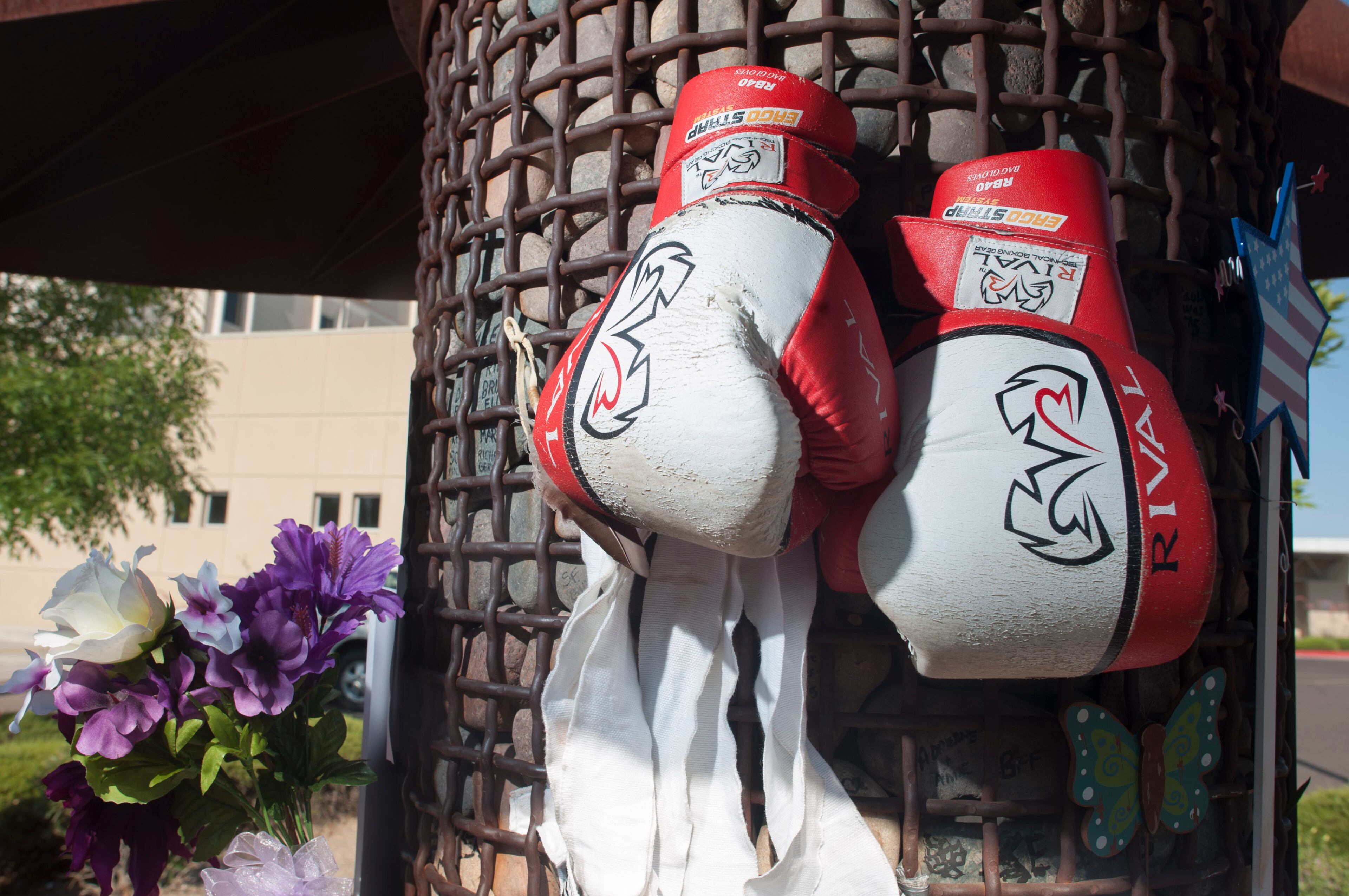A makeshift memorial has been created outside Scottsdale Osborn Medical Center following the death of boxing great Muhammad Ali on June 4, 2016 in Scottsdale, Arizona. Ali died on June 3 at the Medical Center where he had spent the past few days being treated for respiratory complications. (Photo by Laura Segall/Getty Images)