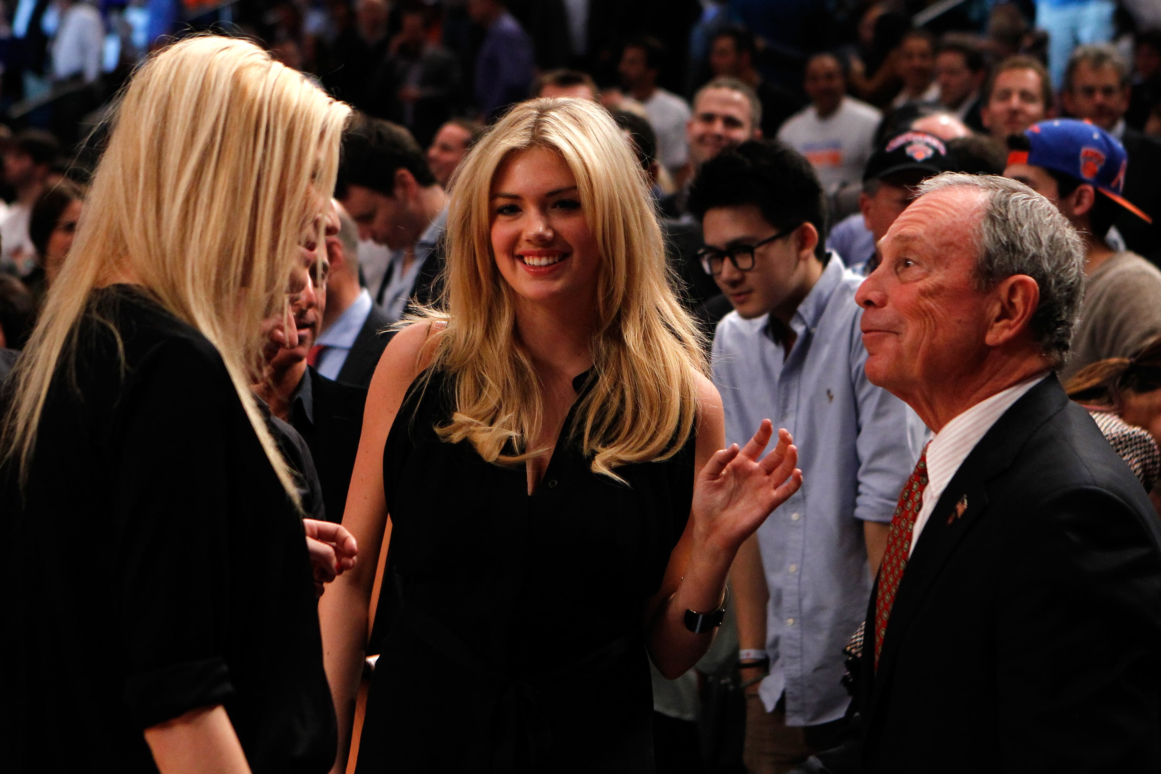Swimsuit model Kate Upton (center) and New York City Mayor Michael Bloomberg attends the New York Knicks game against the Miami Heat in Game Three of the Eastern Conference Quarterfinals in the 2012 NBA Playoffs on May 3, 2012, at Madison Square Garden in New York City.