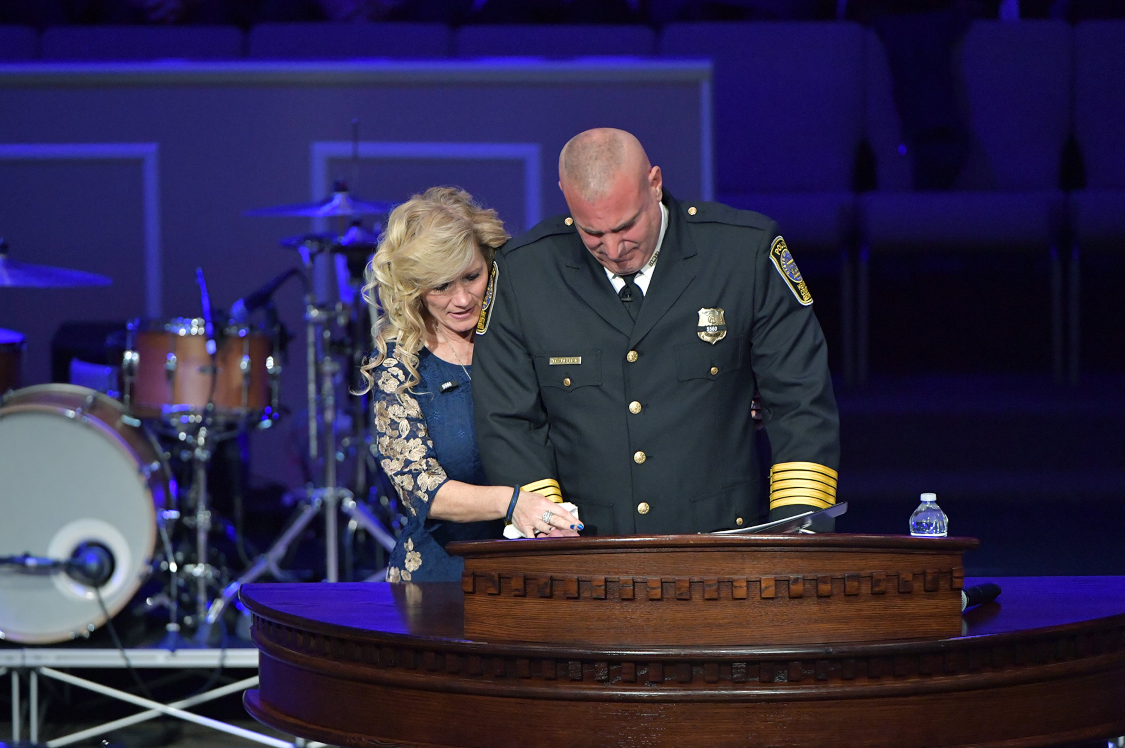 January 3, 2019 McDonough - Henry County police chief Mark Amerman is comforted by a family member of Officer Michael Smith during the funeral service of Henry County Police Officer Michael Smith at Glen Haven Baptist Church in McDonough on Thursday, January 3, 2019. Smith was shot Dec. 6 ââ¬â struck in the face by the same bullet that killed the man heââ¬â¢d tried to subdue. Smith survived emergency surgery and was recovering when his condition changed. On Dec. 28, he died from his injuries. Smith was 33. HYOSUB SHIN / HSHIN@AJC.COM
