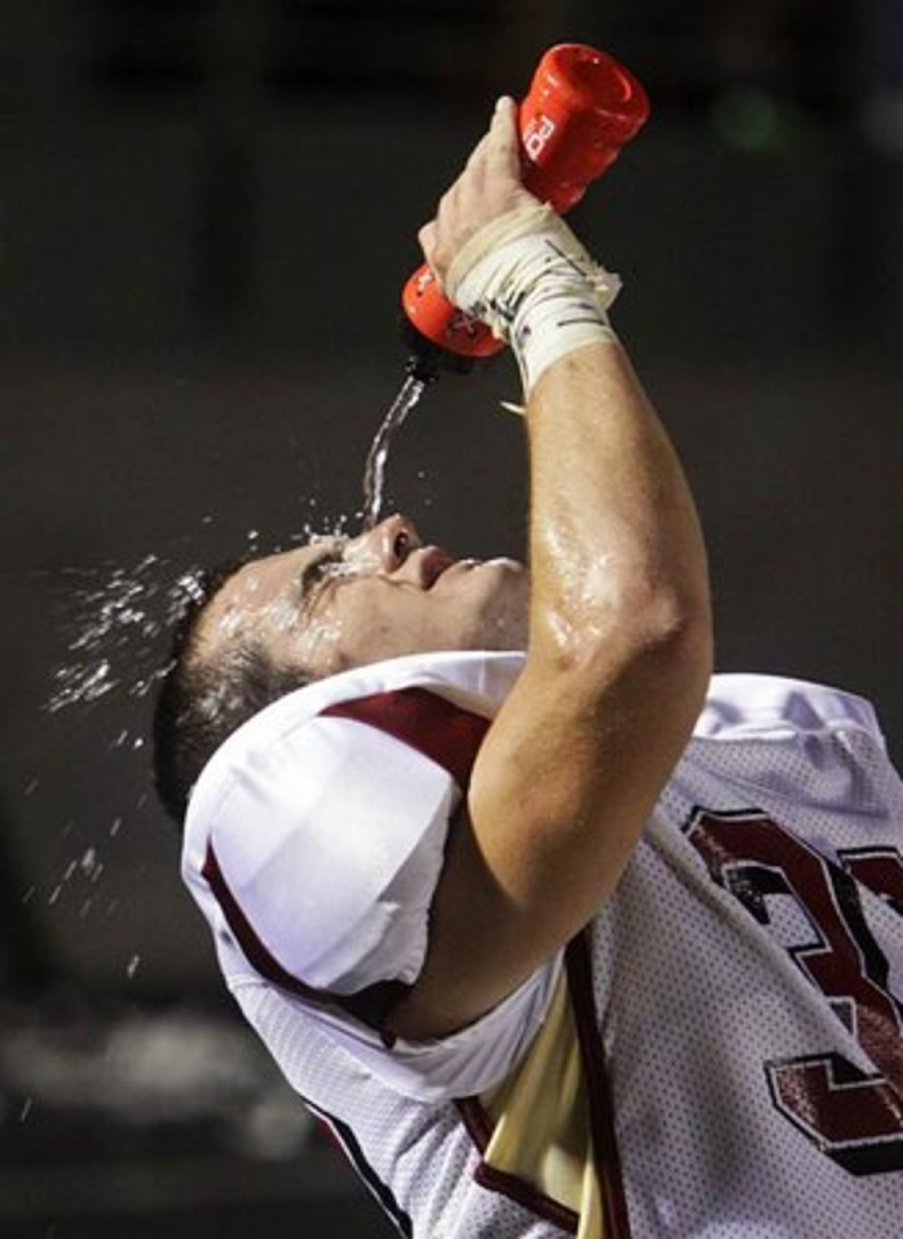 Brookwood's Aaron Daly takes a moment on the sideline to cool off.