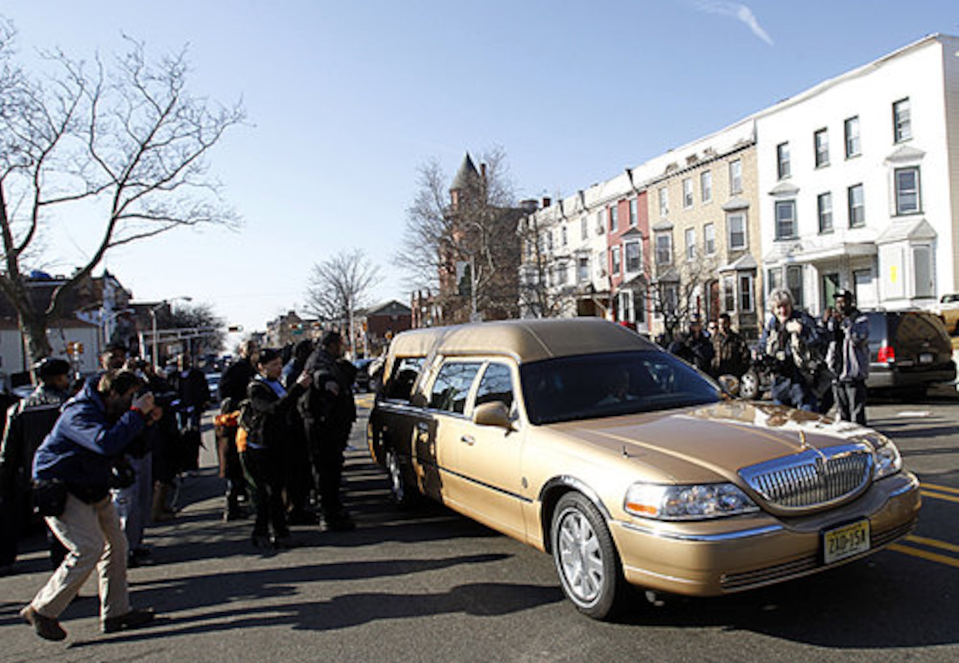 The hearse carrying the body of Whitney Houston leaves Whigham Funeral Home in Newark, N.J. for a short ride to the New Hope Baptist Church for her funeral Saturday, Feb. 18, 2012.