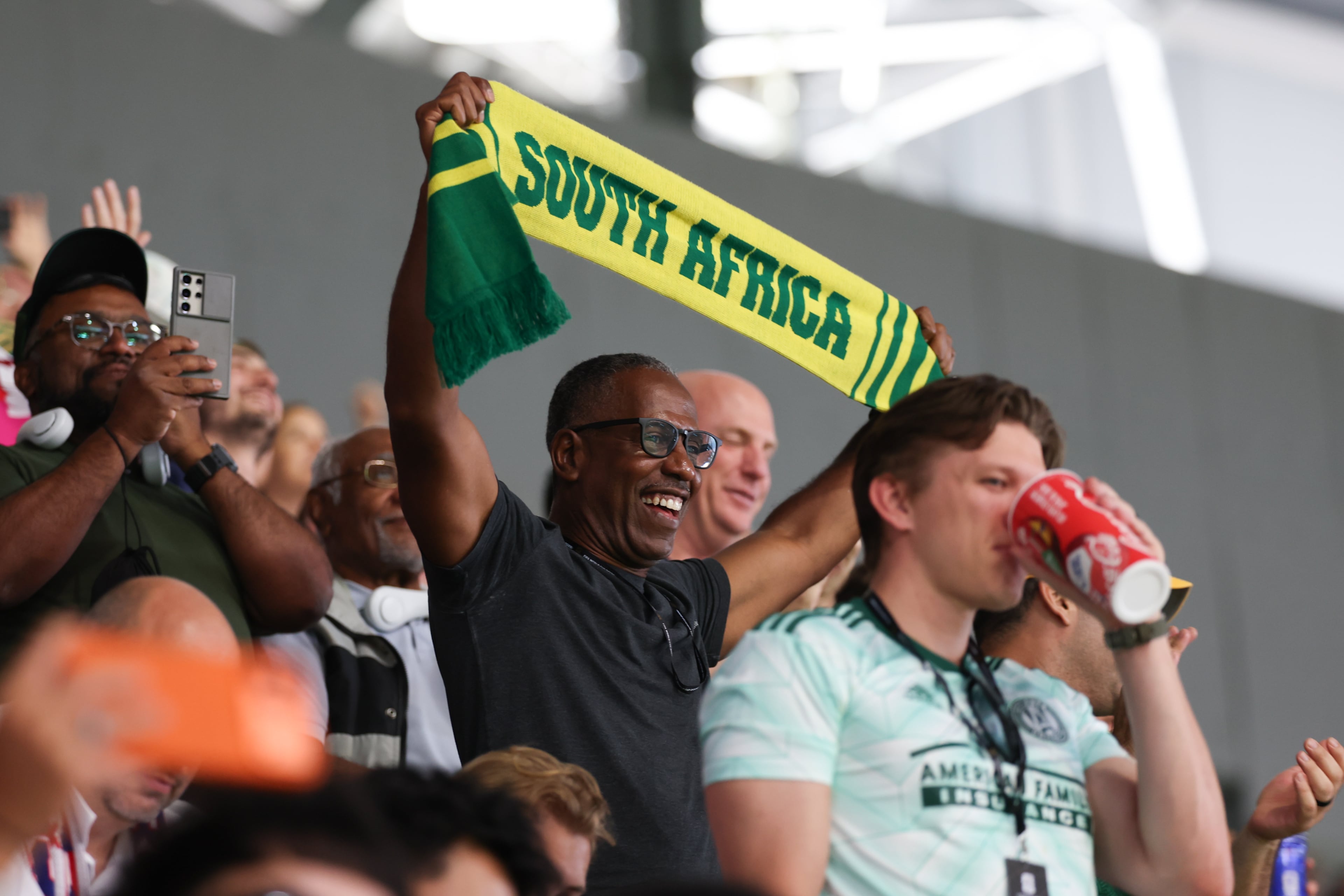 A South Africa fan celebrates a goal in the second half of the FIFA World Cup Czechia vs. South Africa game at Atlanta Stadium (Mercedes-Benz Stadium) in Atlanta on June 18, 2026. (Arvin Temkar/AJC)