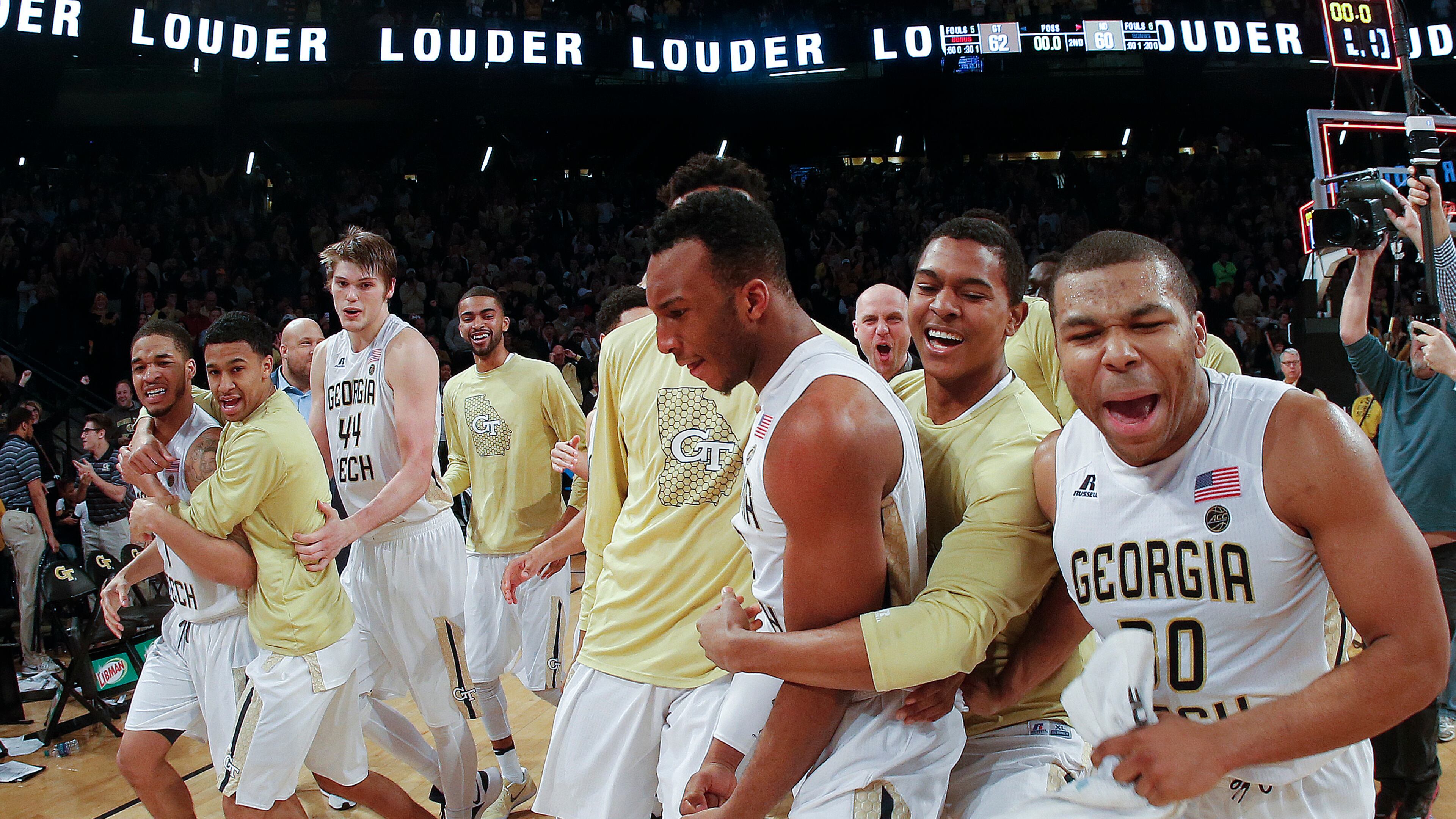 Georgia Tech players celebrate after defeating Notre Dame 62-60 in an NCAA college basketball game Saturday, Jan. 28, 2017, in Atlanta. (AP Photo/John Bazemore)