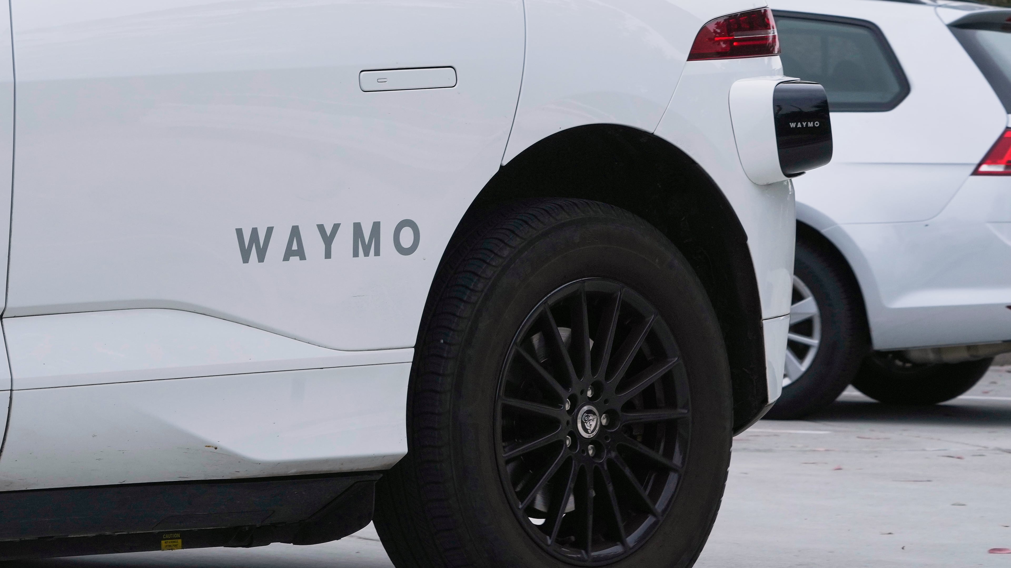 FILE - A Waymo vehicle drives in San Francisco, July 3, 2025. (AP Photo/Jeff Chiu, File)