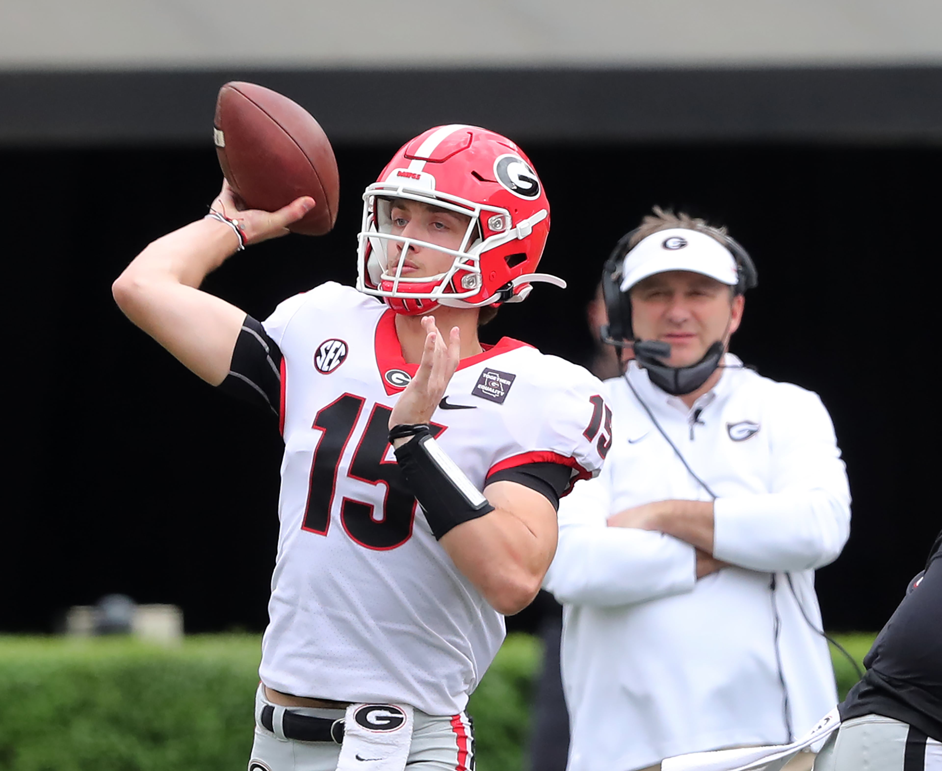 Georgia head coach Kirby Smart looks on as quarterback Carson Beck completes a pass during the G-Day Game at Sanford Stadium on Saturday, April 17, 2021, in Athens. “Curtis Compton / Curtis.Compton@ajc.com”