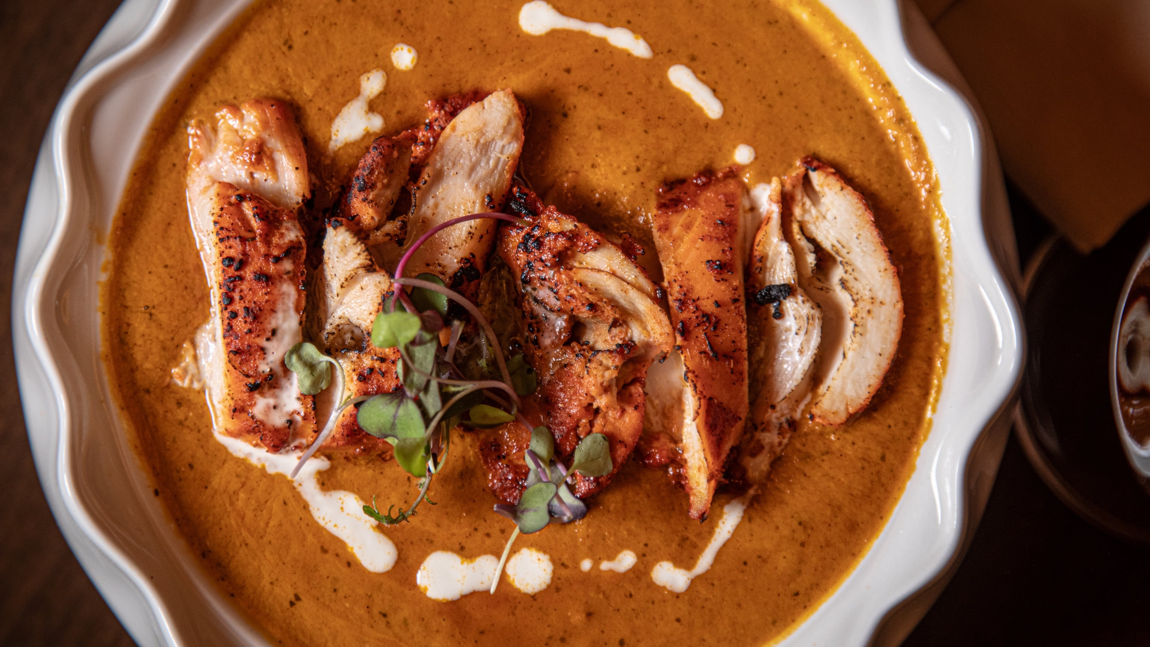 Old Delhi butter chicken at Pataaka, a new modern Indian restaurant at Spring Quarter in Midtown. (Spark Novus, courtesy of Pataaka)