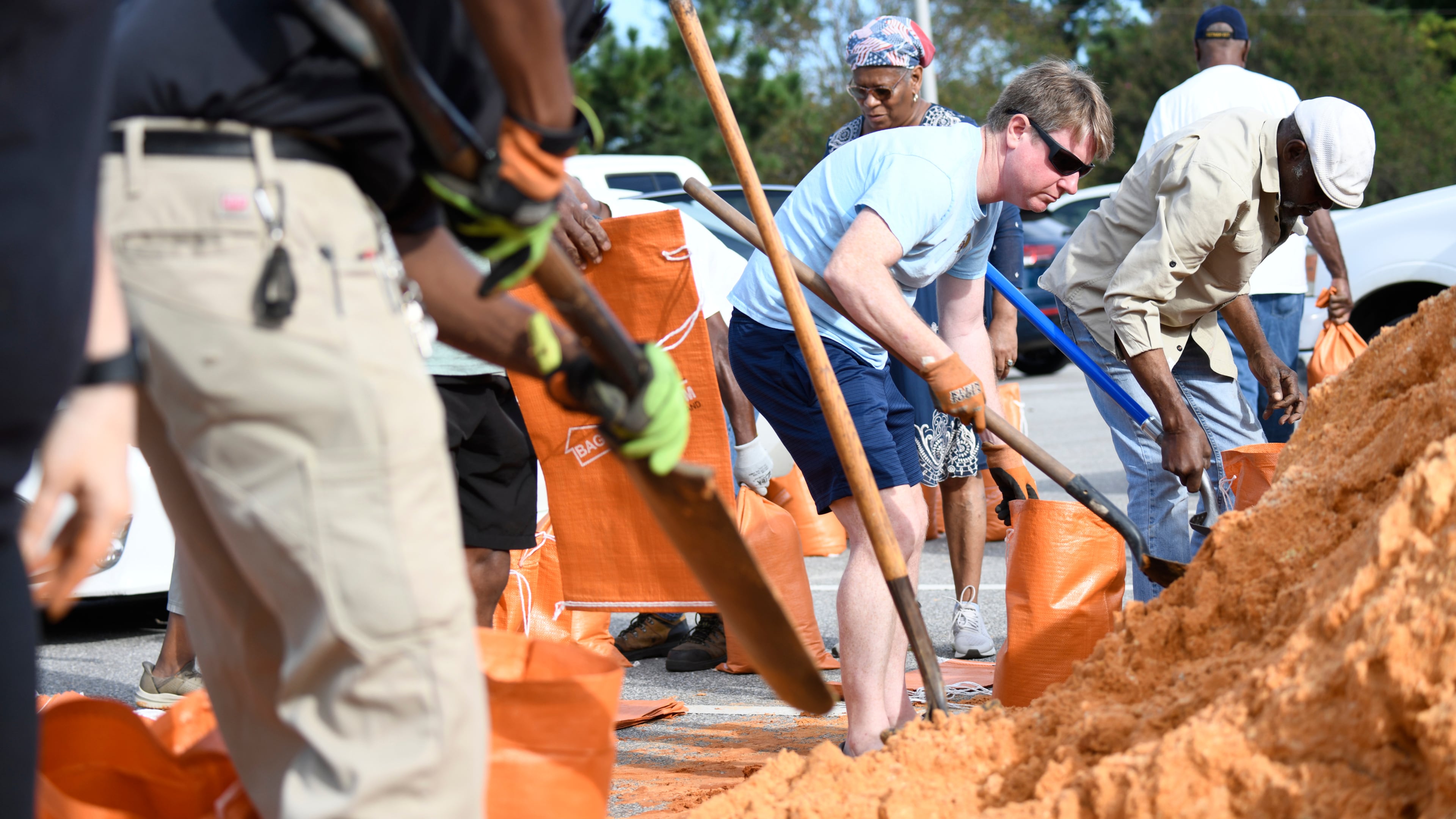 Residents pick up sandbags at the James Seals Jr. Parks & Recreation Center as they prepare for Hurricane Isaias expected landfall along the Gulf Coast, Thursday, Oct. 8, 2026, in Mobile, Ala. (AP Photo/Octavio Jones)
