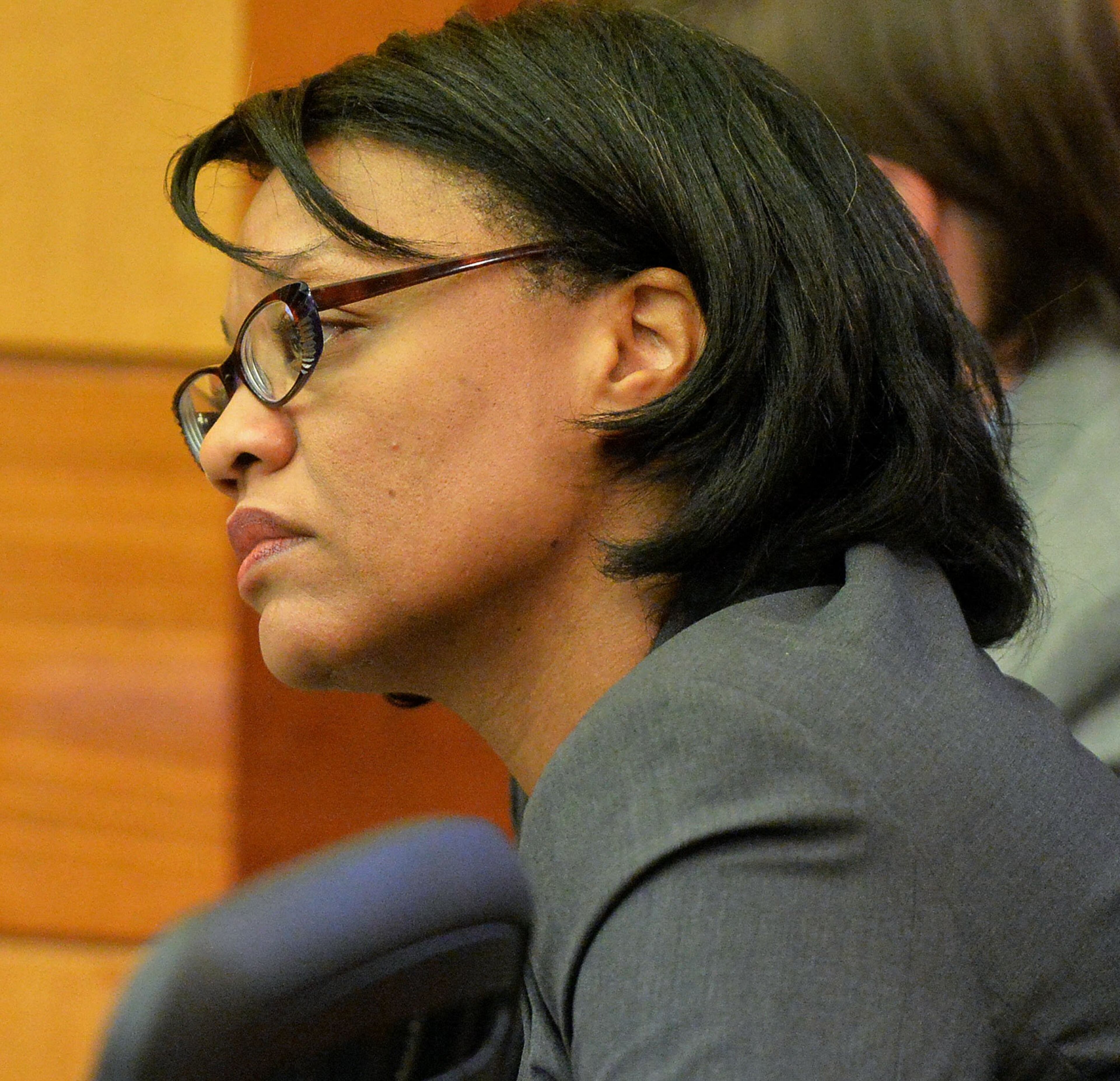 Former APS Dobbs Elementary principal Dana Evans listens as retired APS teacher Lavonia Ferrell continues her testimony about cheating on CRCT tests during the summer school session of 2008 at Deerwood Academy. KENT D. JOHNSON / KDJOHNSON@AJC.COM