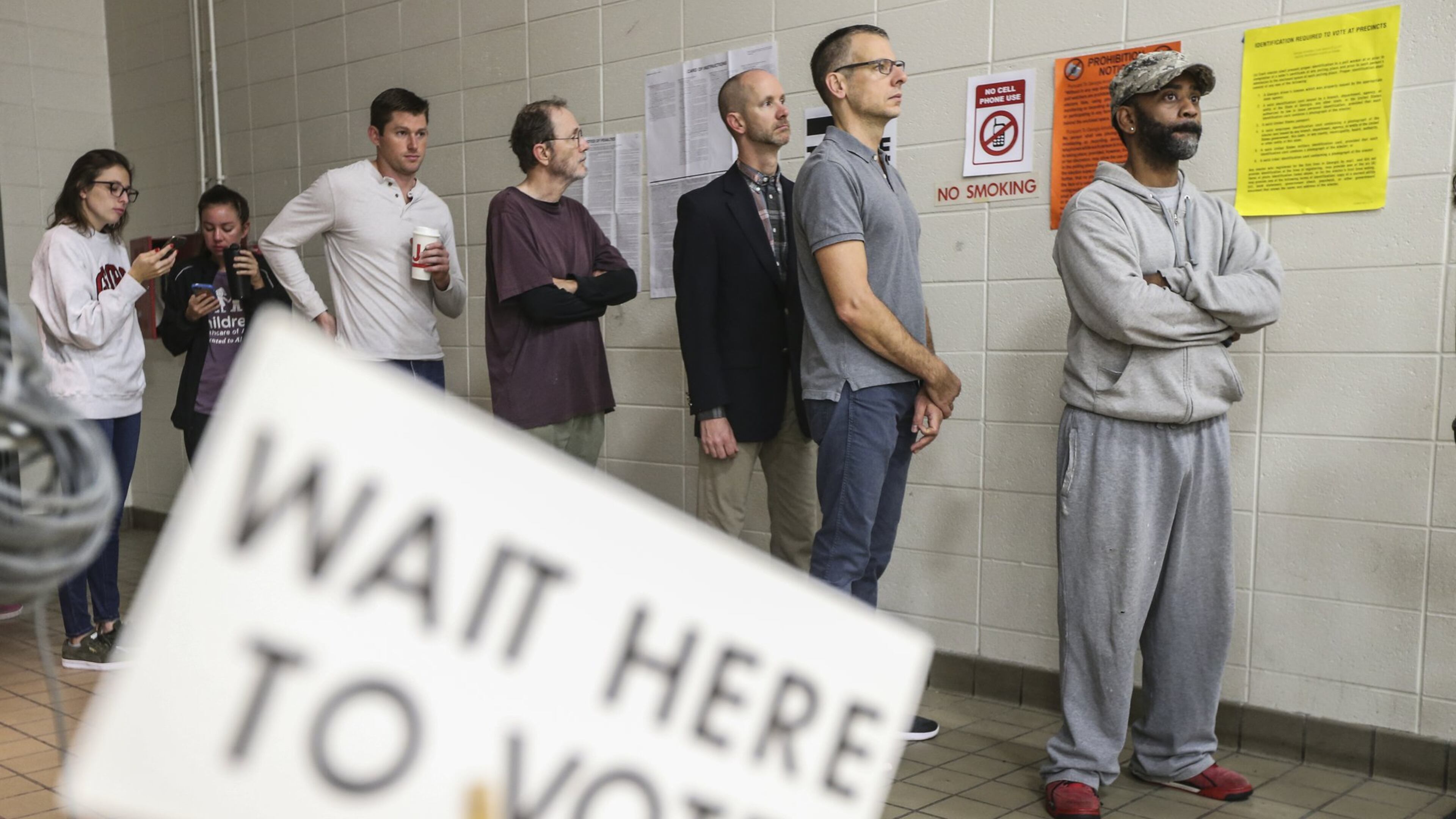 Voters lined up early at Henry W. Grady High School in Atlanta on Tuesday. JOHN SPINK/JSPINK@AJC.COM AJC FILE PHOTO