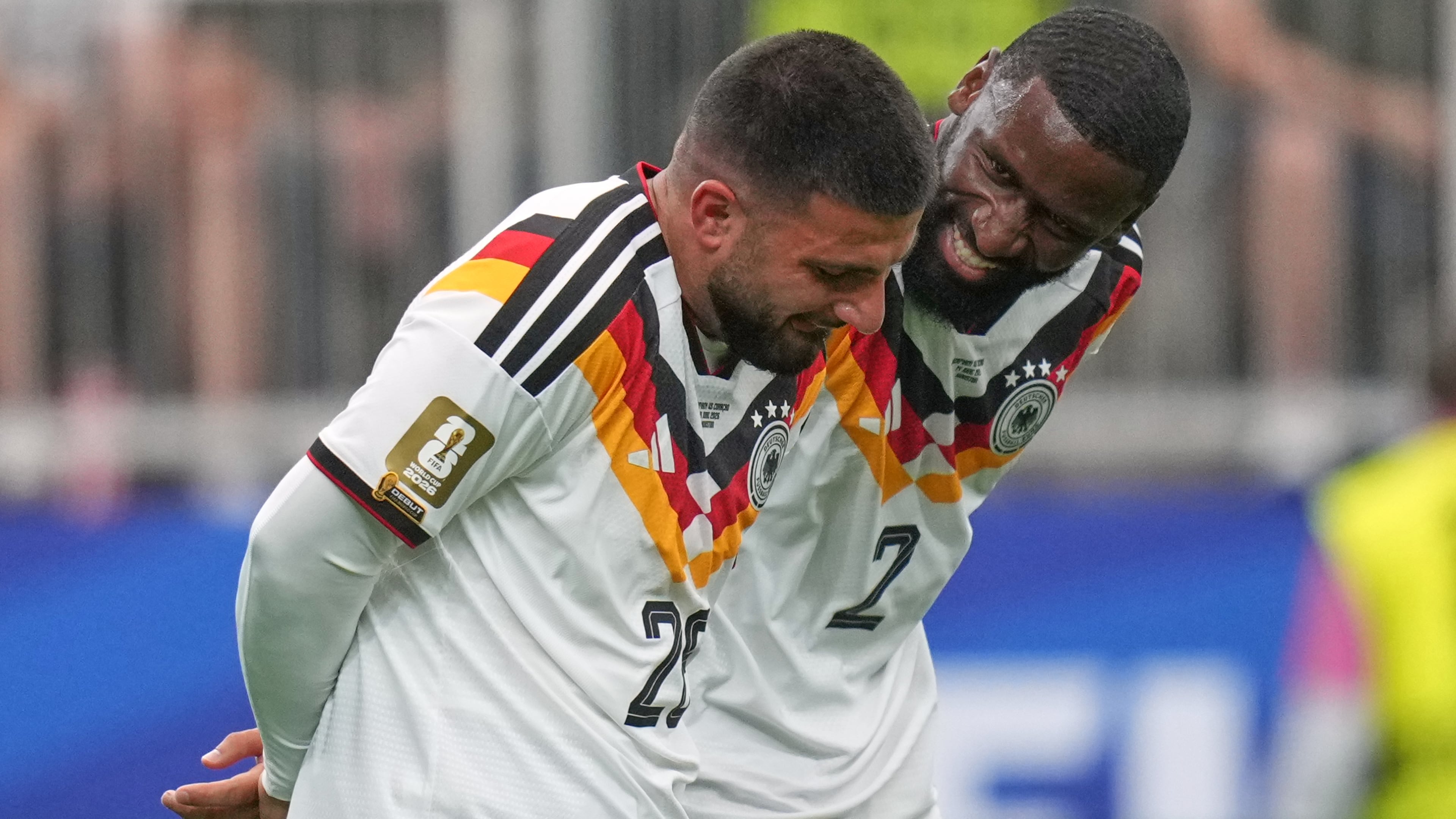 Germany's Deniz Undav, left, and Antonio Ruediger reacts after scoring the sixth goal during the World Cup Group E soccer match between Germany and Curacao in Houston, Sunday, June 14, 2026. (AP Photo/Eric Gay)