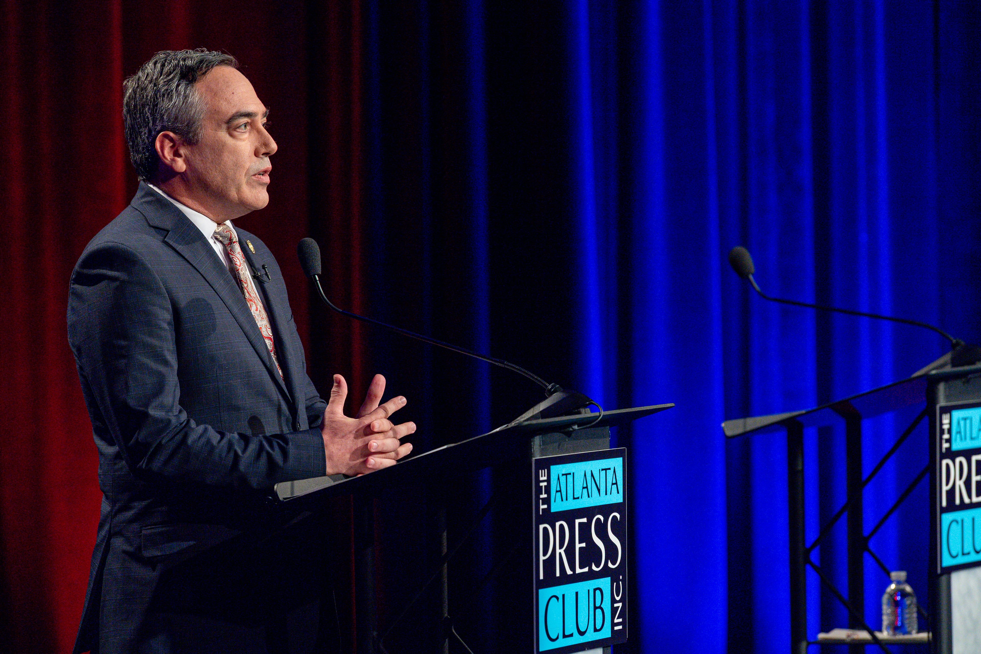 District 3 candidate for Public Service Commission Democrat Peter Hubbard debates an empty lectern during the Atlanta Press Club Loudermilk-Young Debate Series on Oct. 12, 2026. Republican opponent Fitz Johnson declined to join. (Pool photos by J Glenn Photography)