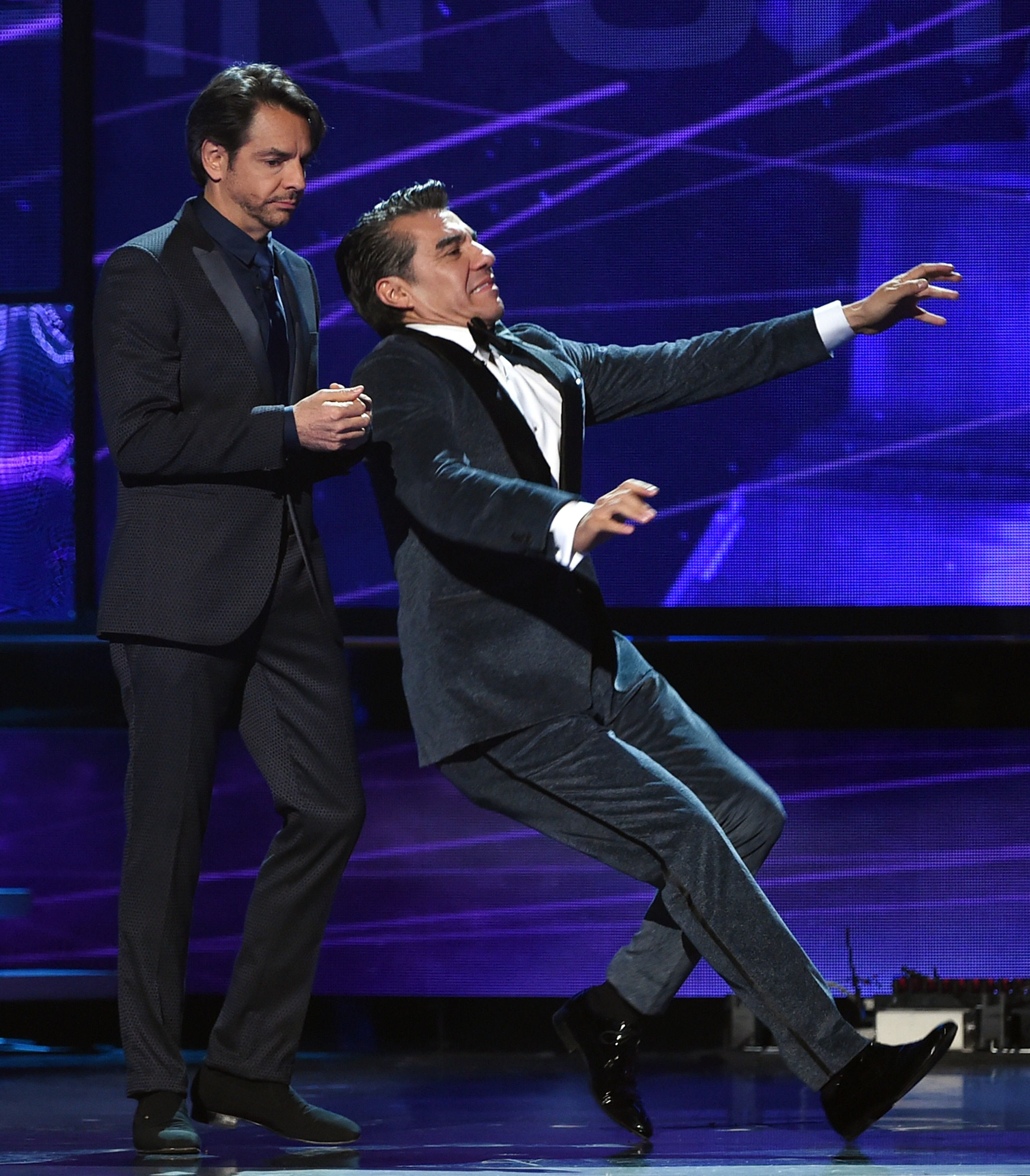 LAS VEGAS, NV - NOVEMBER 20: Co-host Eugenio Derbez (L) and actor Adrian Uribe joke around during the 15th annual Latin GRAMMY Awards at the MGM Grand Garden Arena on November 20, 2014 in Las Vegas, Nevada. (Photo by Ethan Miller/Getty Images)