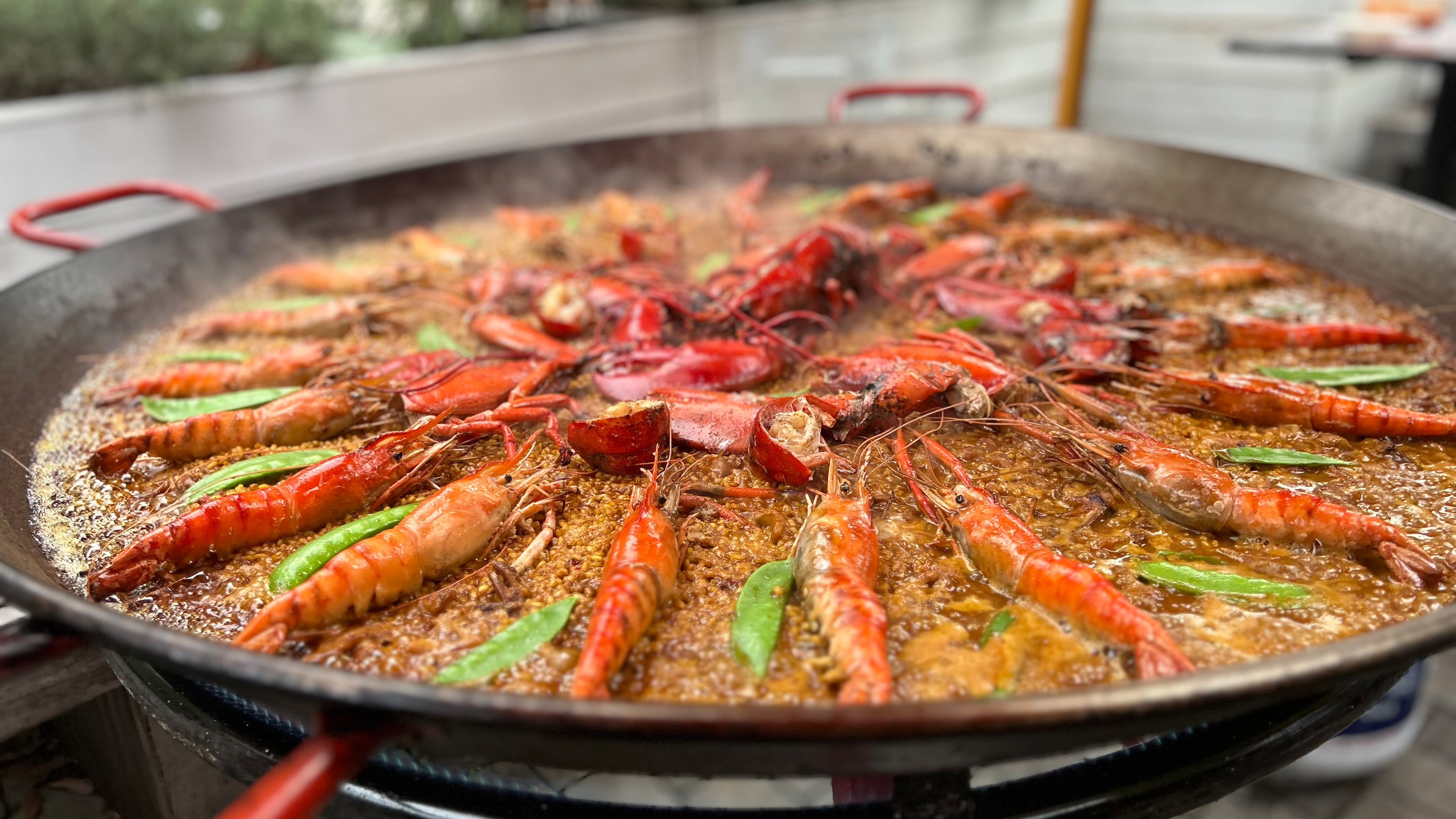 Seafood paella made by chef Ismael Fernández during the paella demonstration held at Buena Vida Tapas Bar. (Candy Hom for the AJC)