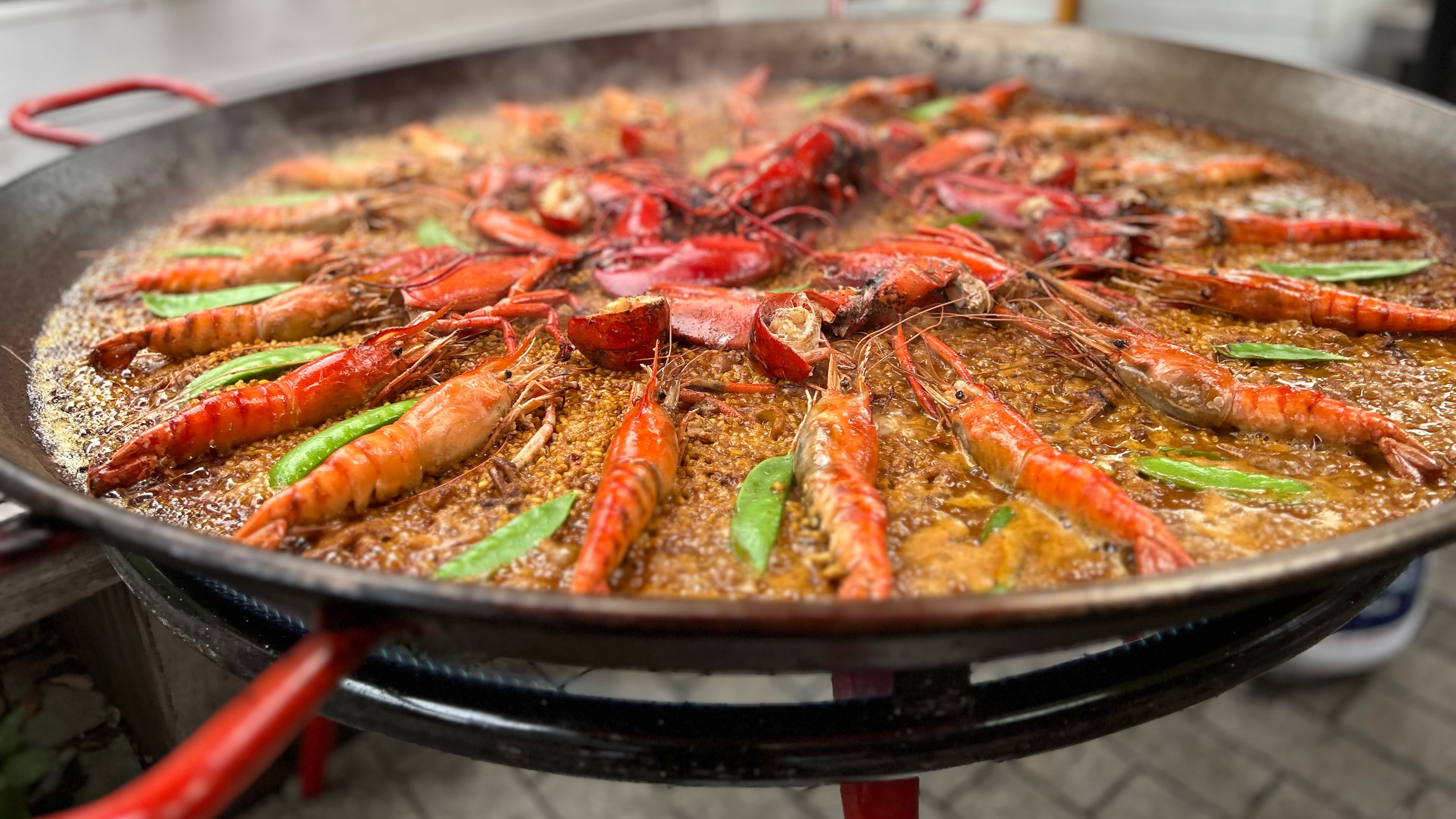 Seafood paella made by chef Ismael Fernández during the paella demonstration held at Buena Vida Tapas Bar. (Candy Hom for the AJC)