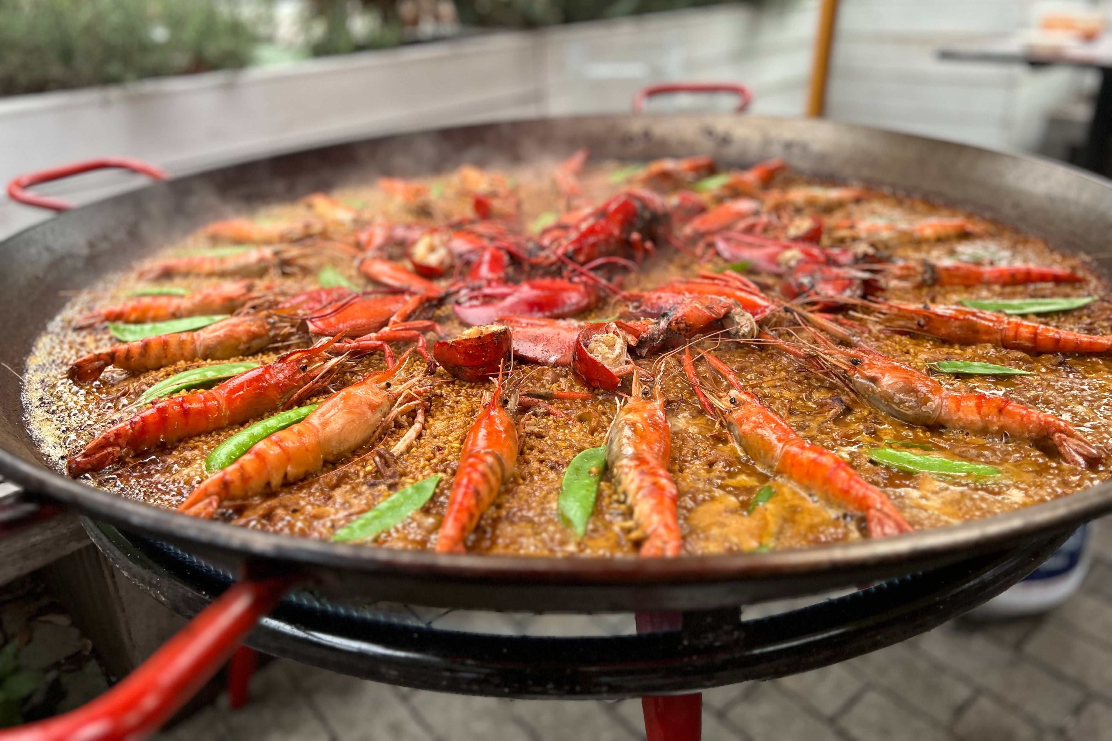 Seafood paella made by chef Ismael Fernández during the paella demonstration held at Buena Vida Tapas Bar. (Candy Hom for the AJC)