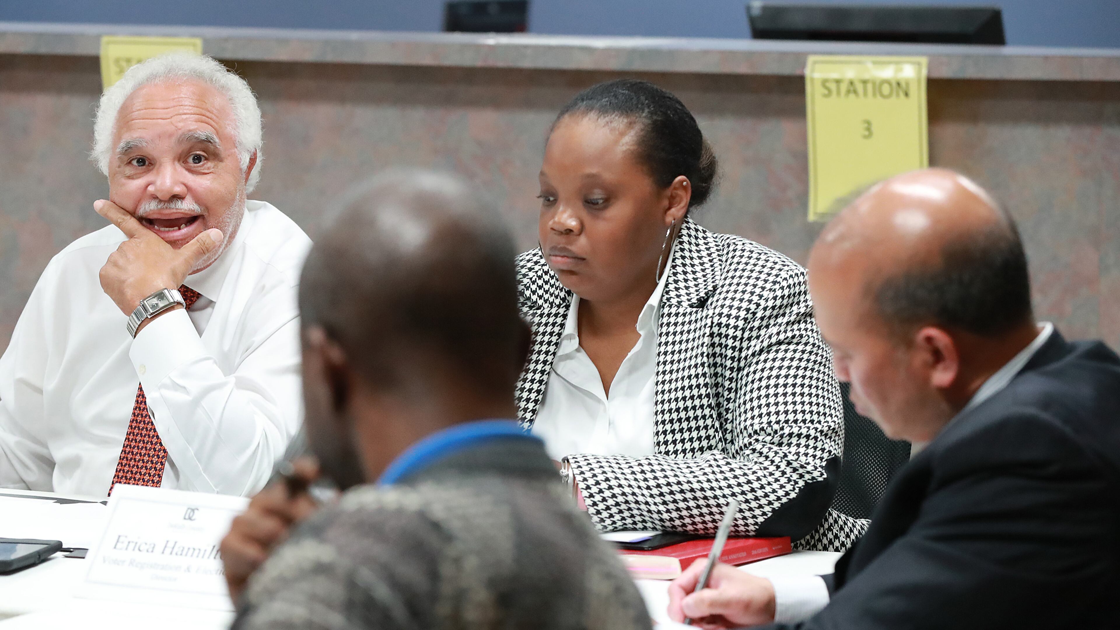 Nov 13, 2018 Decatur: DeKalb County Elections Board members Samuel Tillman (from left), Anthony Lewis, Erica Hamilton, Voter Registration and Elections Director, and Baoky Vu along with other board members vote unanimously to certify it's election results at the DeKalb County Elections office on Tuesday, Nov. 13, 2018, in Decatur. Curtis Compton/ccompton@ajc.com