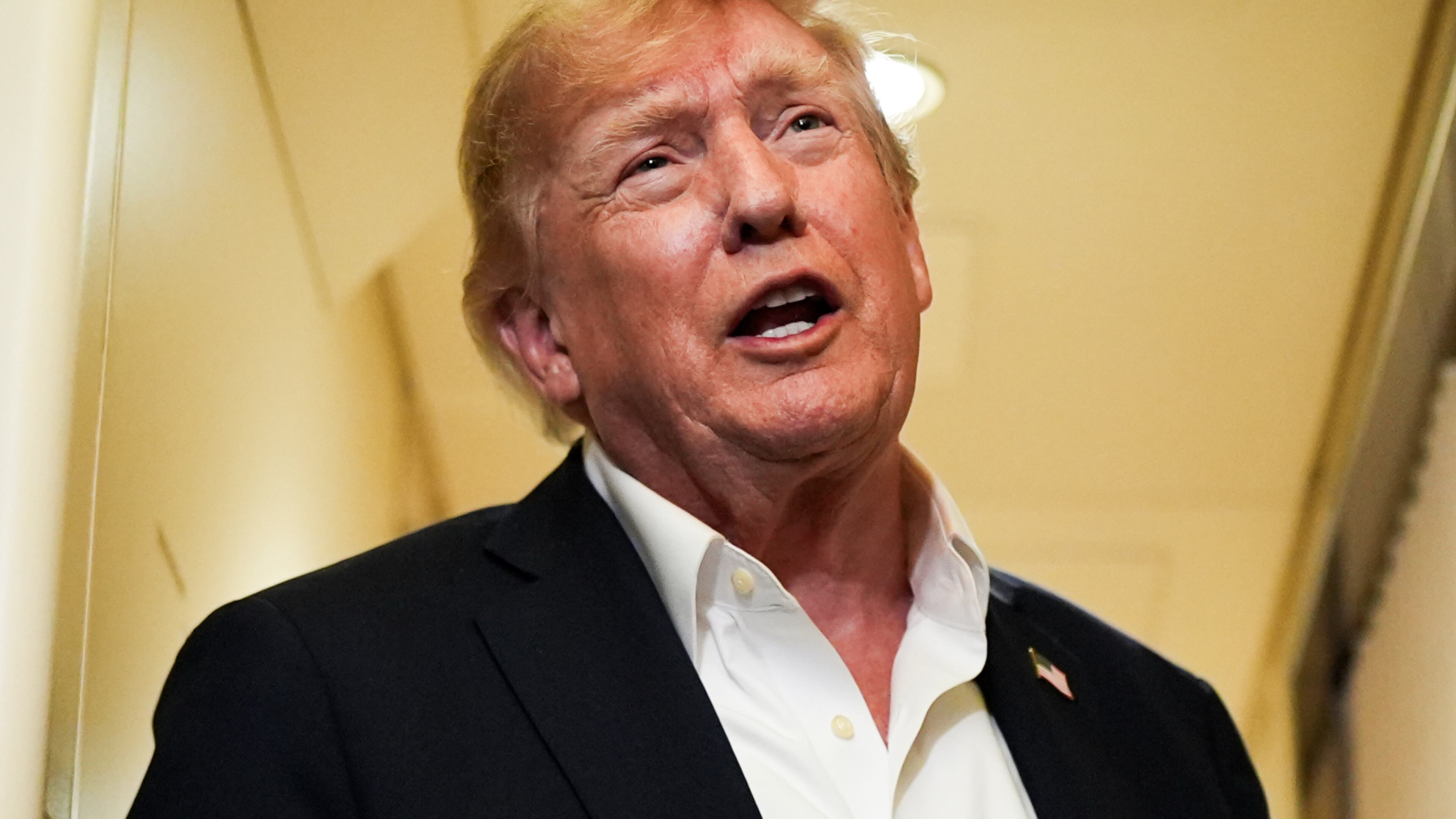 President Donald Trump speaks with reporters while in flight on Air Force One from Shannon, Ireland to Joint Base Andrews, Md., Sunday, Sept. 13, 2026. (AP Photo/Julia Demaree Nikhinson)