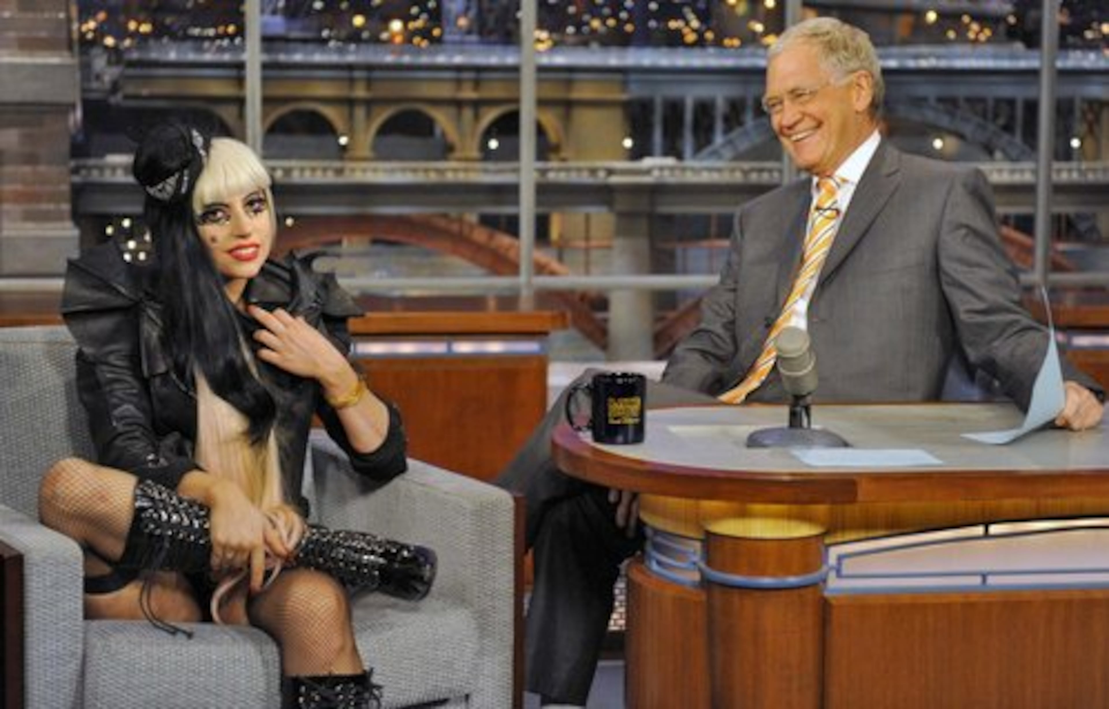 Lady Gaga descended upon the Big Apple for a TV appearance and a promotional event for her new album. Here she's seen with 'Late Show' host David Letterman as they react to a television monitor showing fans lining New York's 53rd street during taping of the Late Show with David Letterman, Monday, May 23, 2011, in New York.