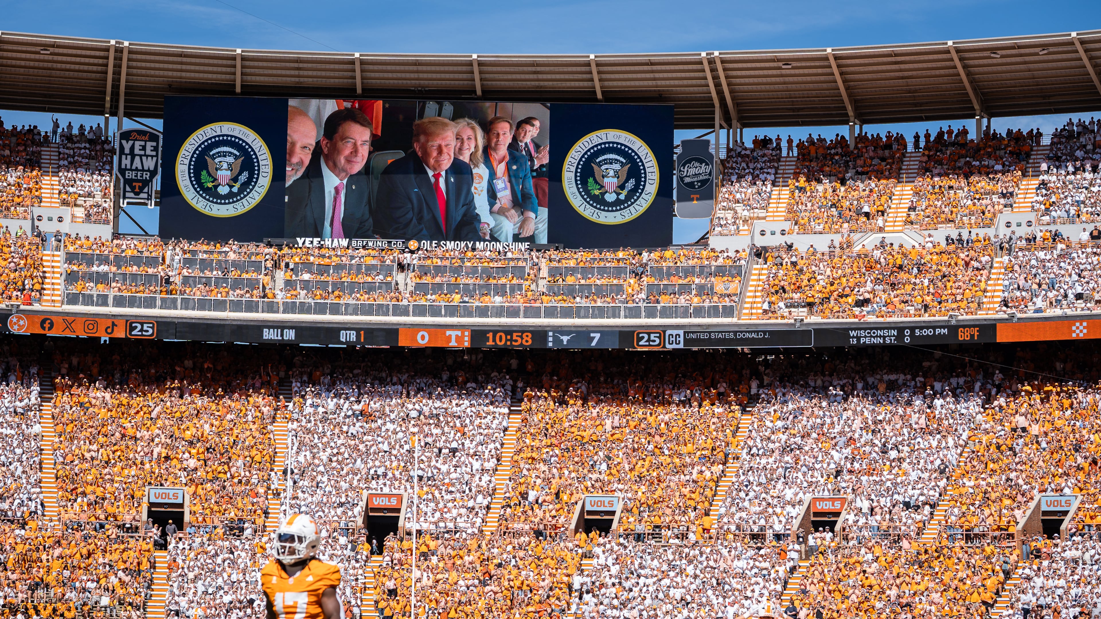 President Donald Trump is displayed on the scoreboard as he attends the Tennessee-Texas NCAA college football game in Knoxville, Tenn., Saturday, Sept. 26, 2026. (Sara Diggins/The San Antonio Express-News via AP)