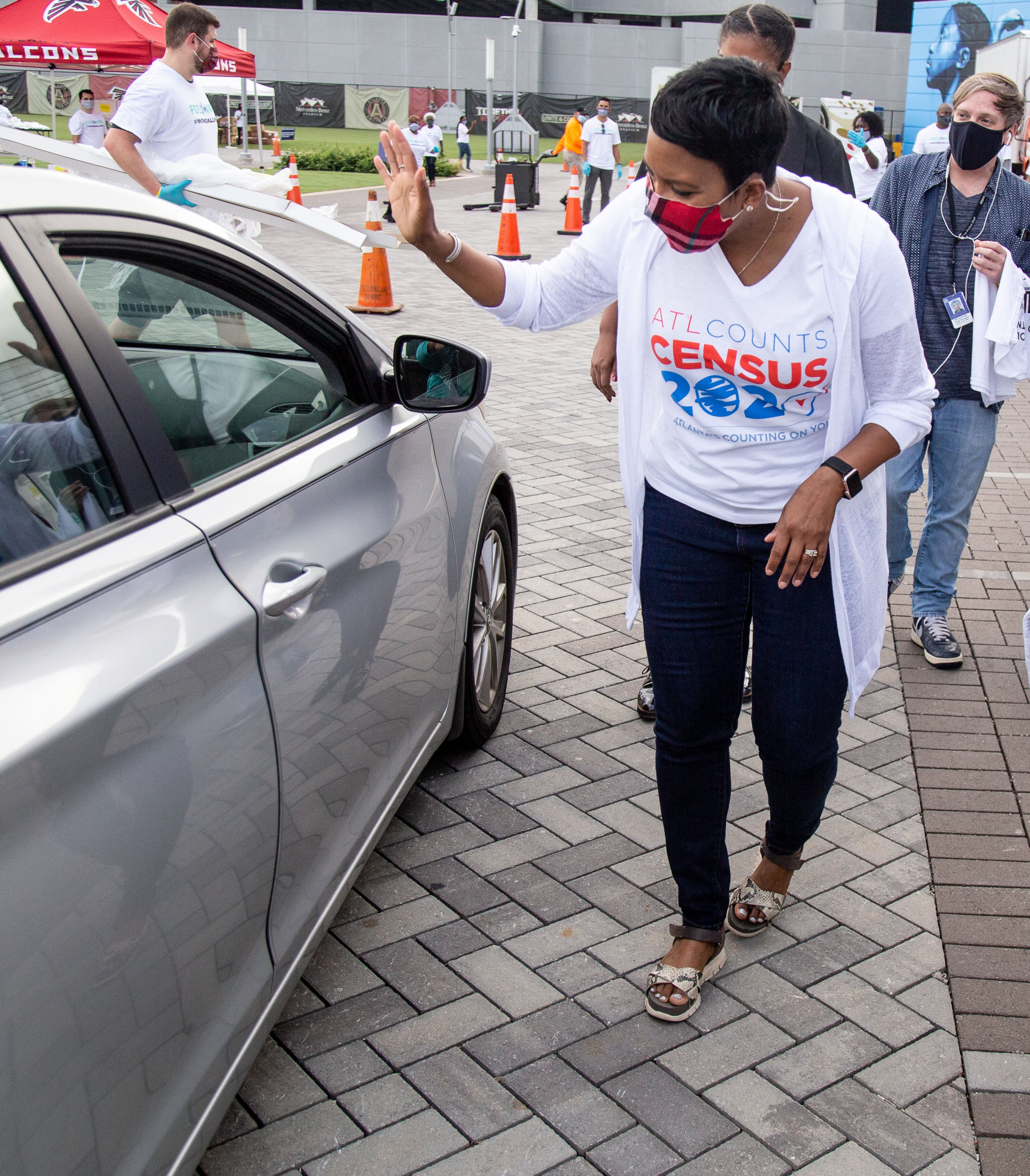 Mayor Keisha Lance Bottoms walks around the Fuel the Vote food giveaway and voter registration drive at The Home Depot Backyard in Atlanta on Saturday, September 26, 2020. Sponsored by Michelle Obama's nonprofit organization When We All Vote , the event provided food and groceries to an estimated 2,500 attendees and helped them prepare to cast their ballots in November. STEVE SCHAEFER / SPECIAL TO THE AJC