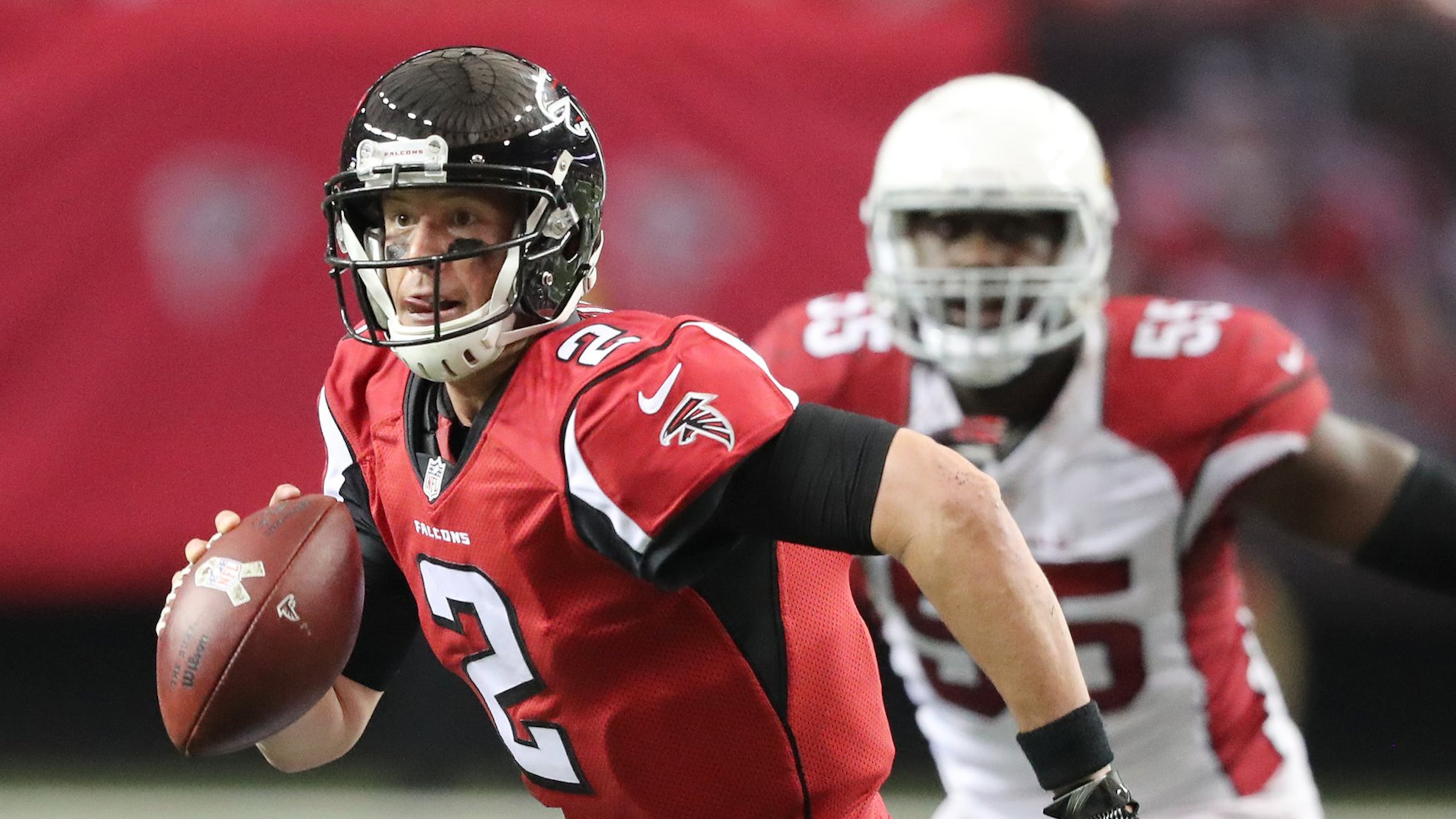 Falcons quarterback Matt Ryan runs for a first down on a quarterback keeper against the Cardinals during the third quarter in an NFL football game on Sunday, Nov. 27, 2016, in Atlanta. Curtis Compton/ccompton@ajc.com